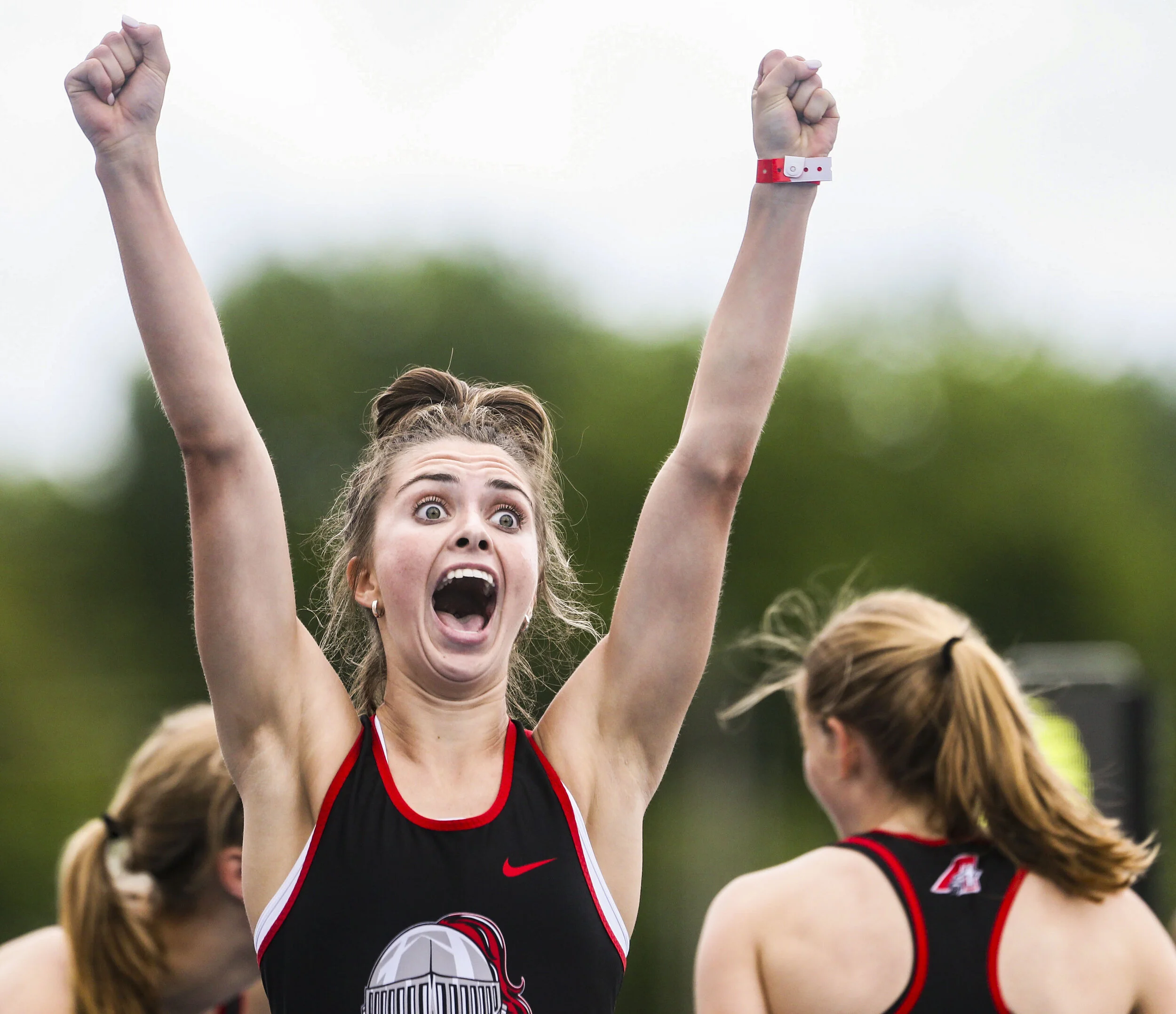  Assumption's Olivia Lynch celebrating after competing in the Class 3A 4x400 meter during the Iowa coed state track and field championships at Drake Stadium in Des Moines. 