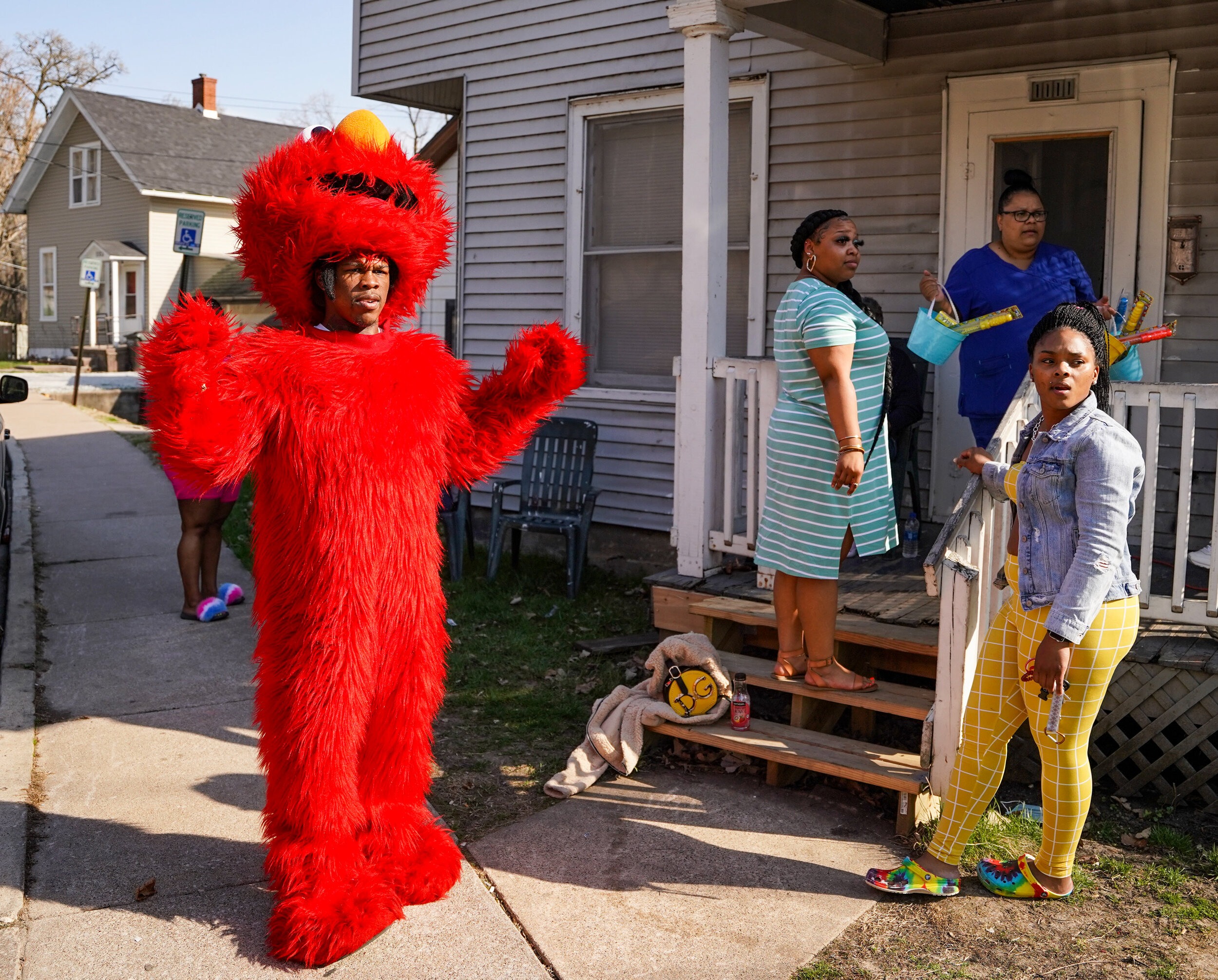  Pachino Hill dresses as Elmo during his families Easter celebration in Davenport, Sunday, April 4, 2021. 