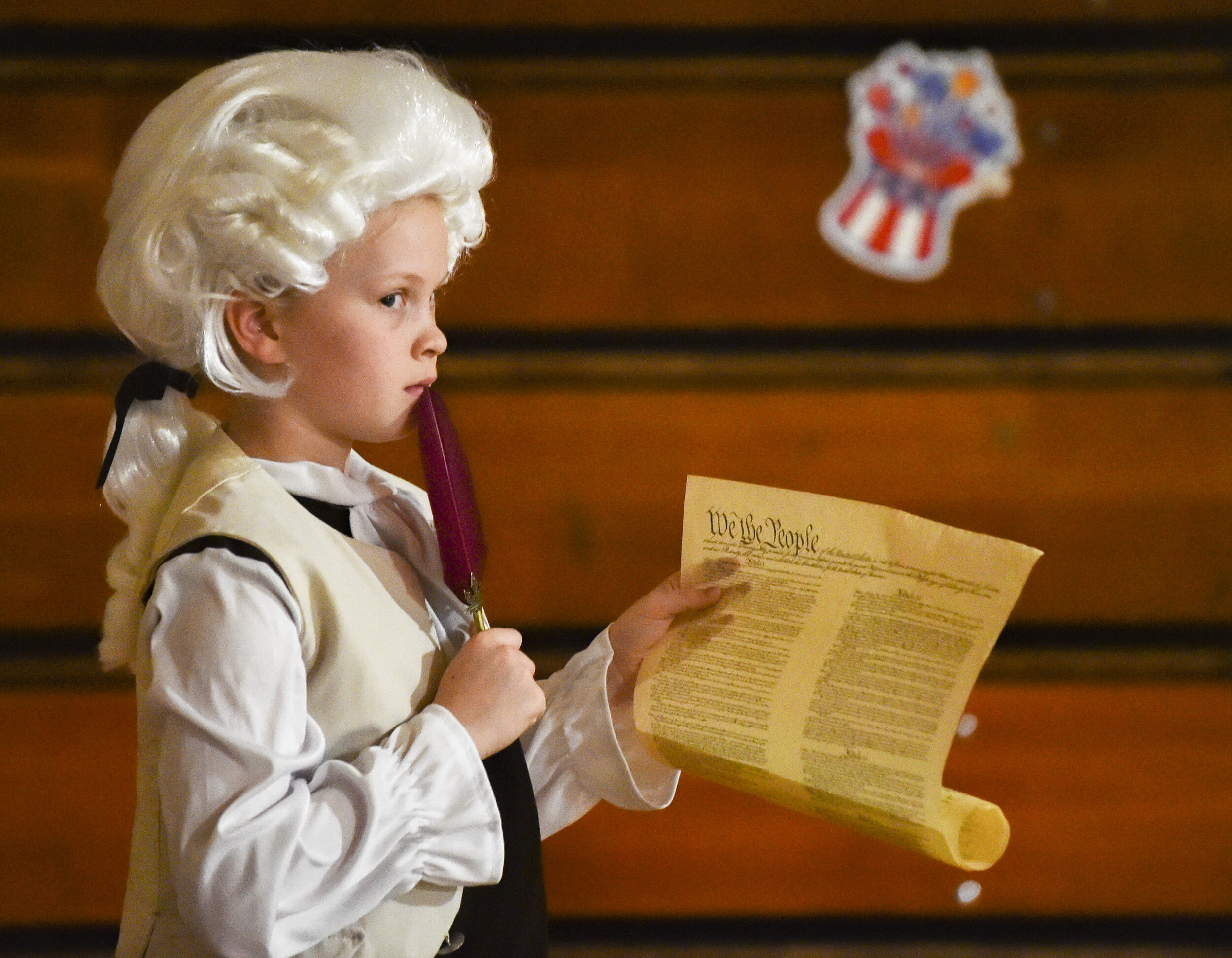  Seton Catholic Elementary School 4th grader ALexis Burkett, stands at the ready to give her presentation about former U.S. President James Madison during the school's 'Presidential Wax Museum' event Thursday, March 1, 2019 in Moline. Every year the 