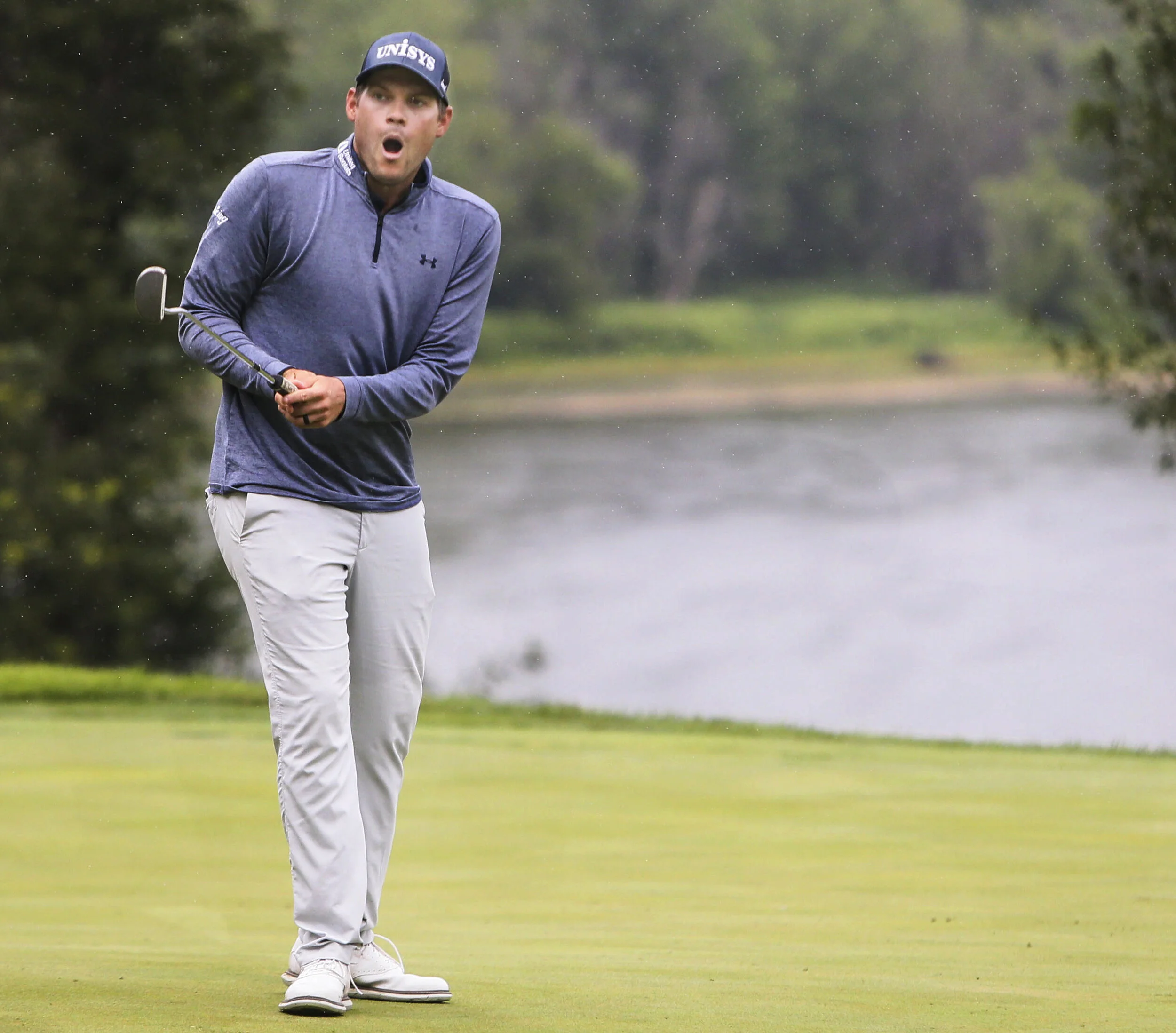  Adam Schenk's reaction after putting from the 16th hole during the final round of the John Deere Classic at TPC Deere Run in Silvis. 