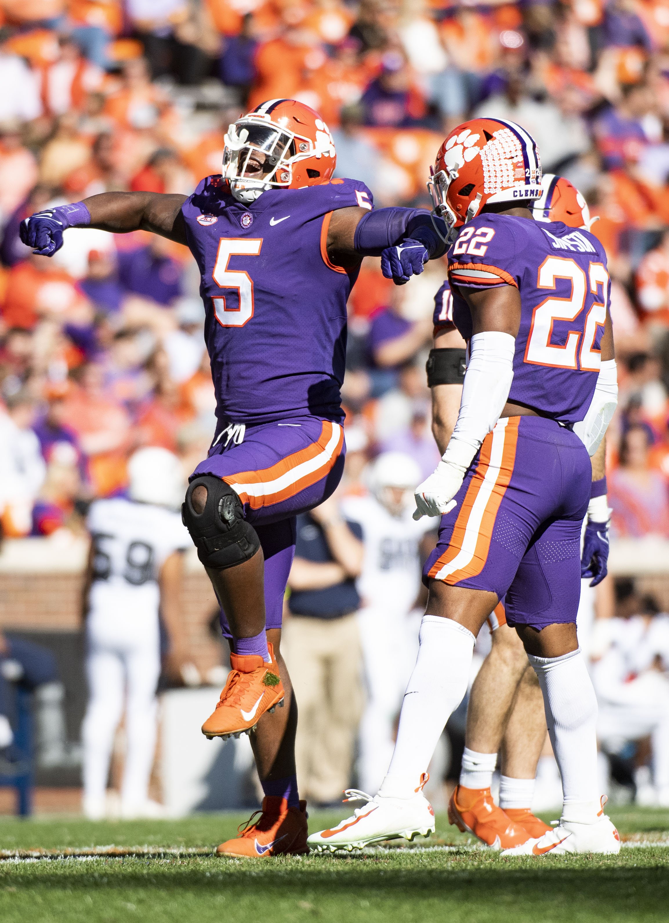  Clemson Tigers defensive end K.J. Henry (5) celebrates after a play against Connecticut Huskies at Memorial Stadium Saturday, Nov. 13, 2021. 