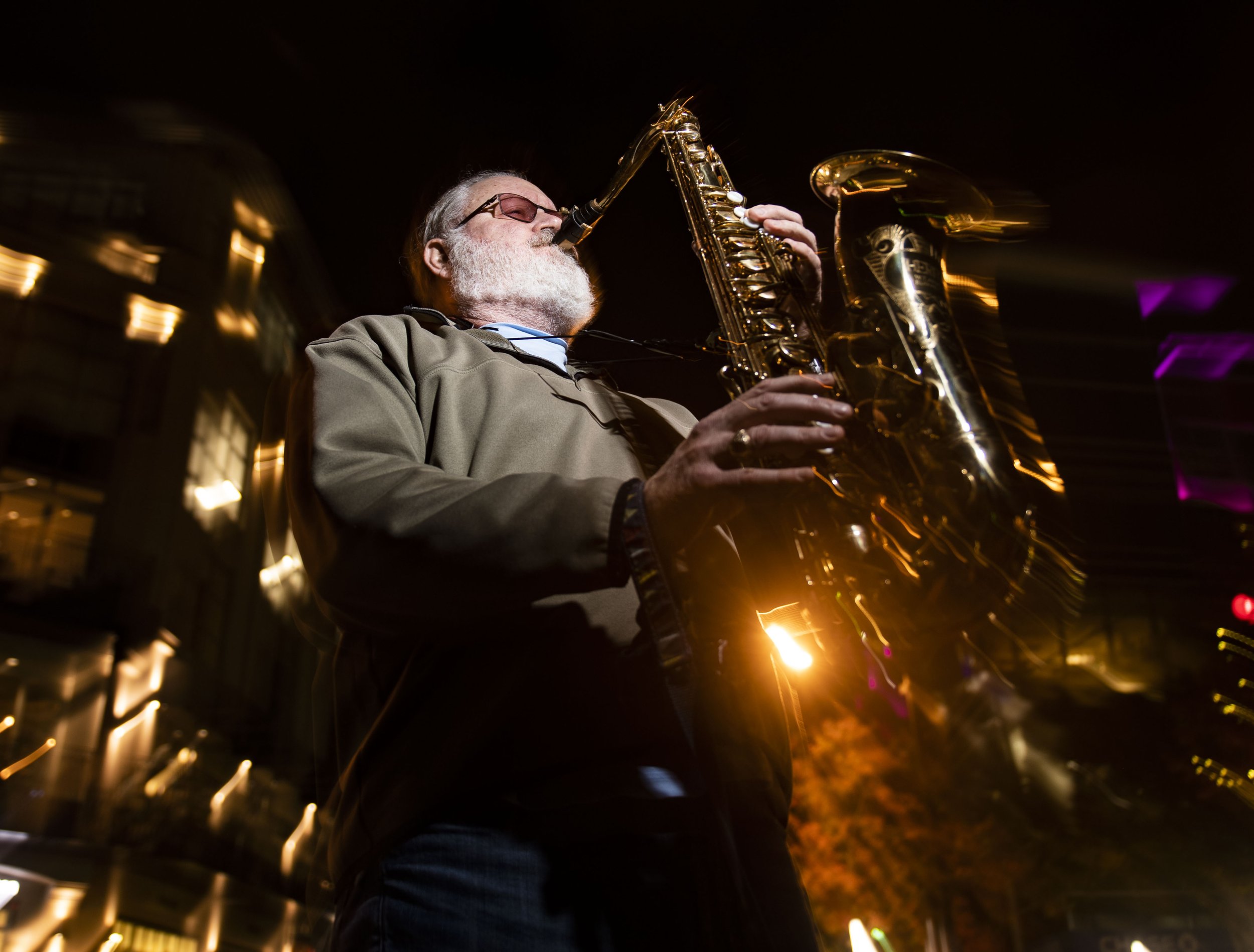  John Sterling of Greenville, plays his saxophone around downtown Greenville, Tuesday, November 16, 2021.   