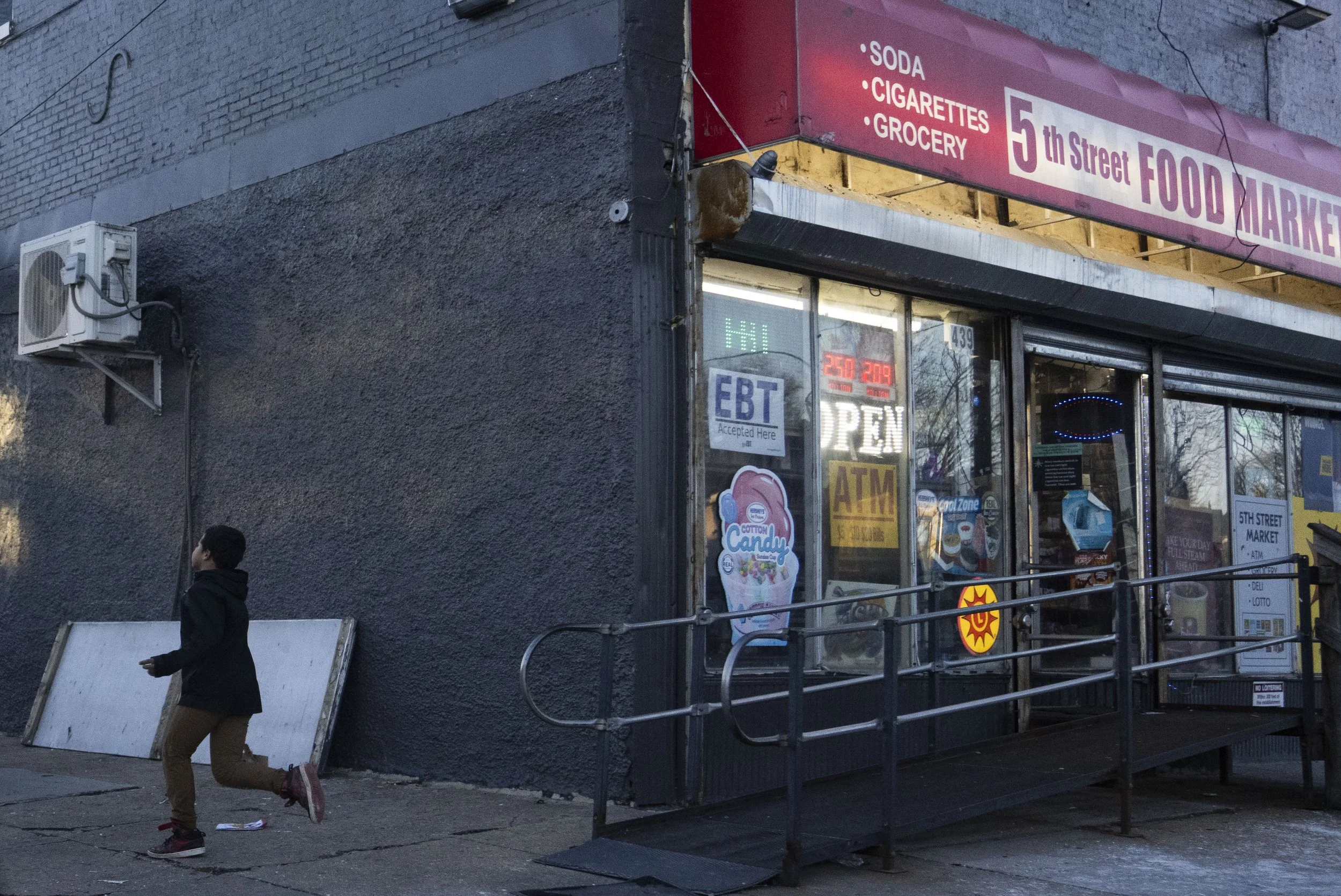  A child runs around the corner near a shop in Brooklyn that’s popular with neighborhood children. People said Tristan briefly stayed in an apartment above it. 