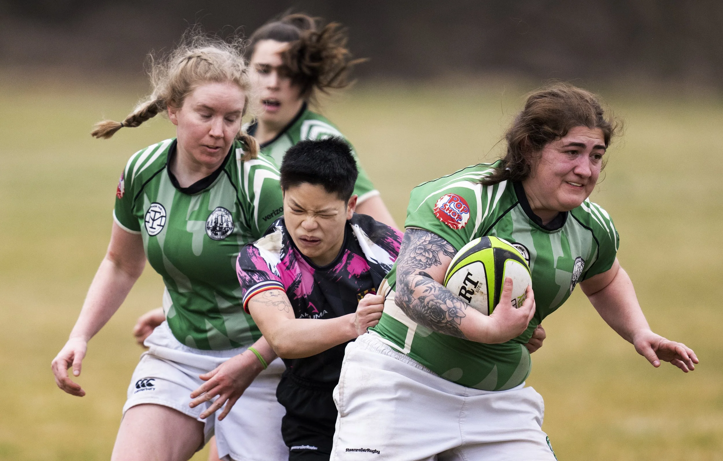  Feral’s Marlowe Simek attempts to take down Frederick WRFC player Carsen during their game in Baltimore, Saturday, March 15, 2025. 