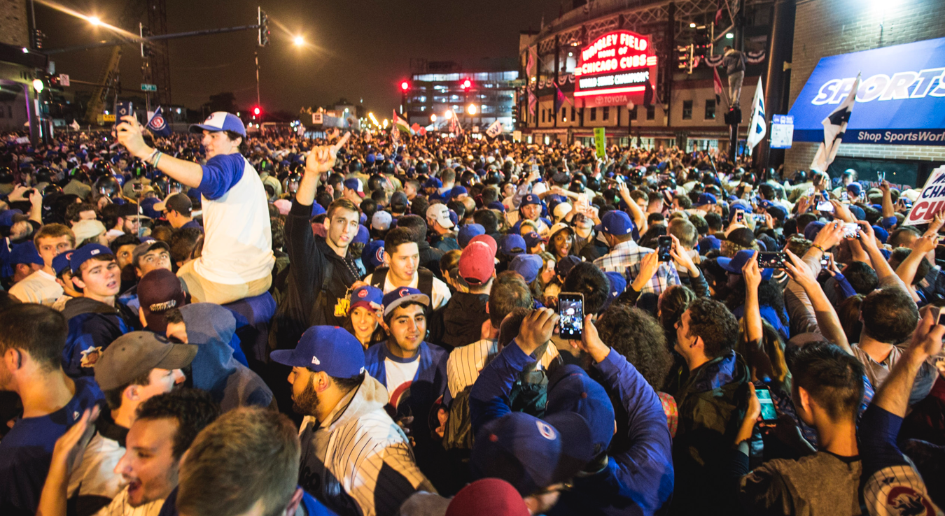 And as blurry as it is, this is the only memorable photo I took that night on top of someone's shoulders seeing the city scream in excitement in that very moment as the sign reads "World Series Champions". 
