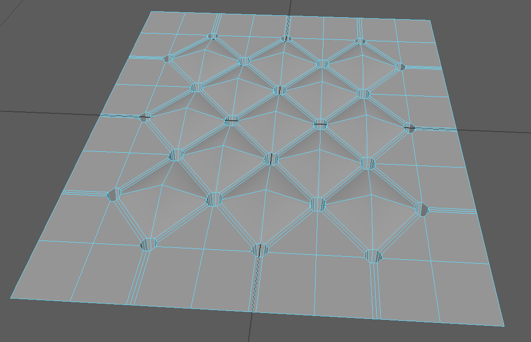 Here is the plane with pixels chamfered and creases beveled. The button holes are extruded down and small pyramids were created by raising the pixels in the middle.