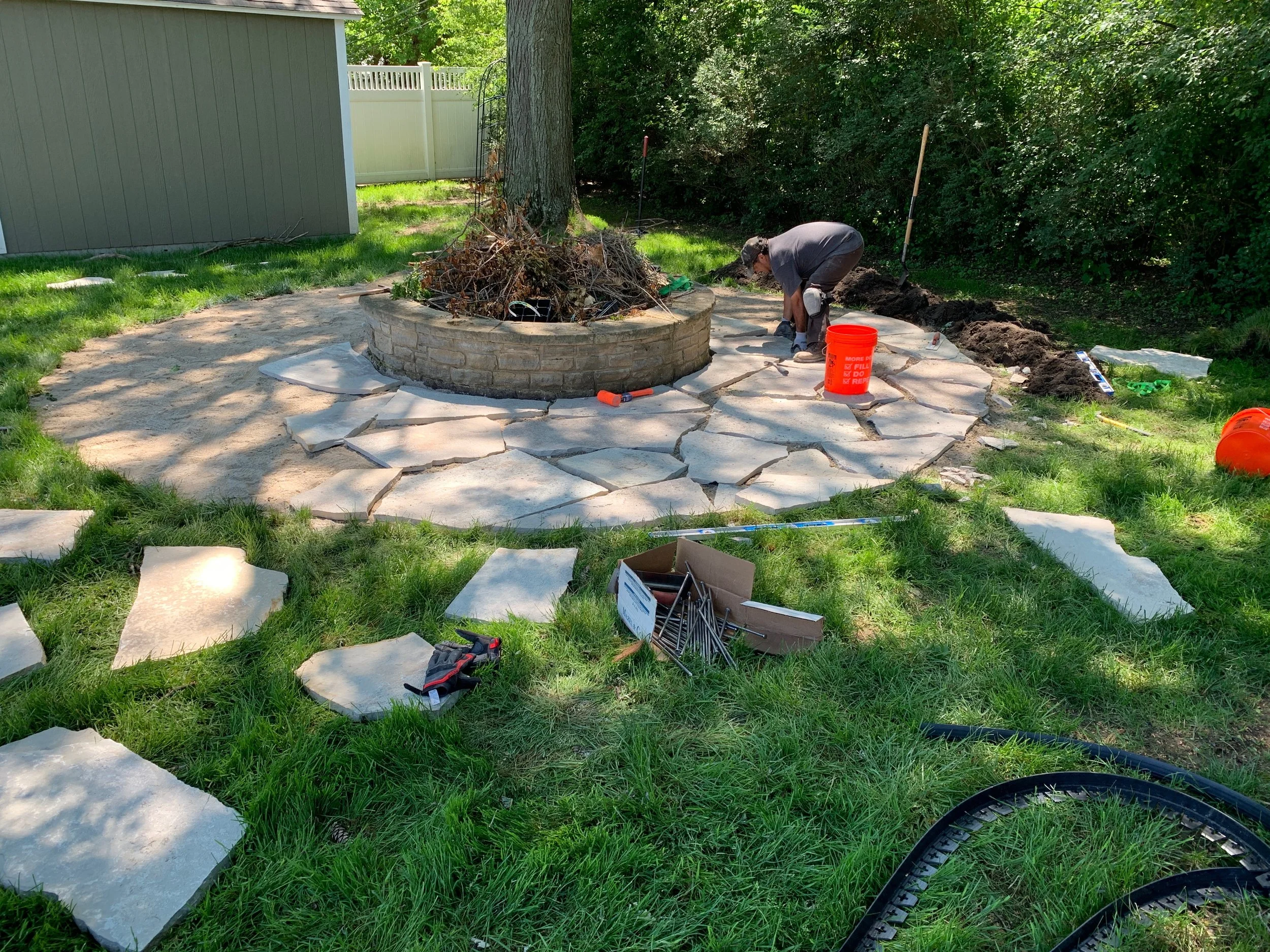Natural flagstone patio and fire-pit installation