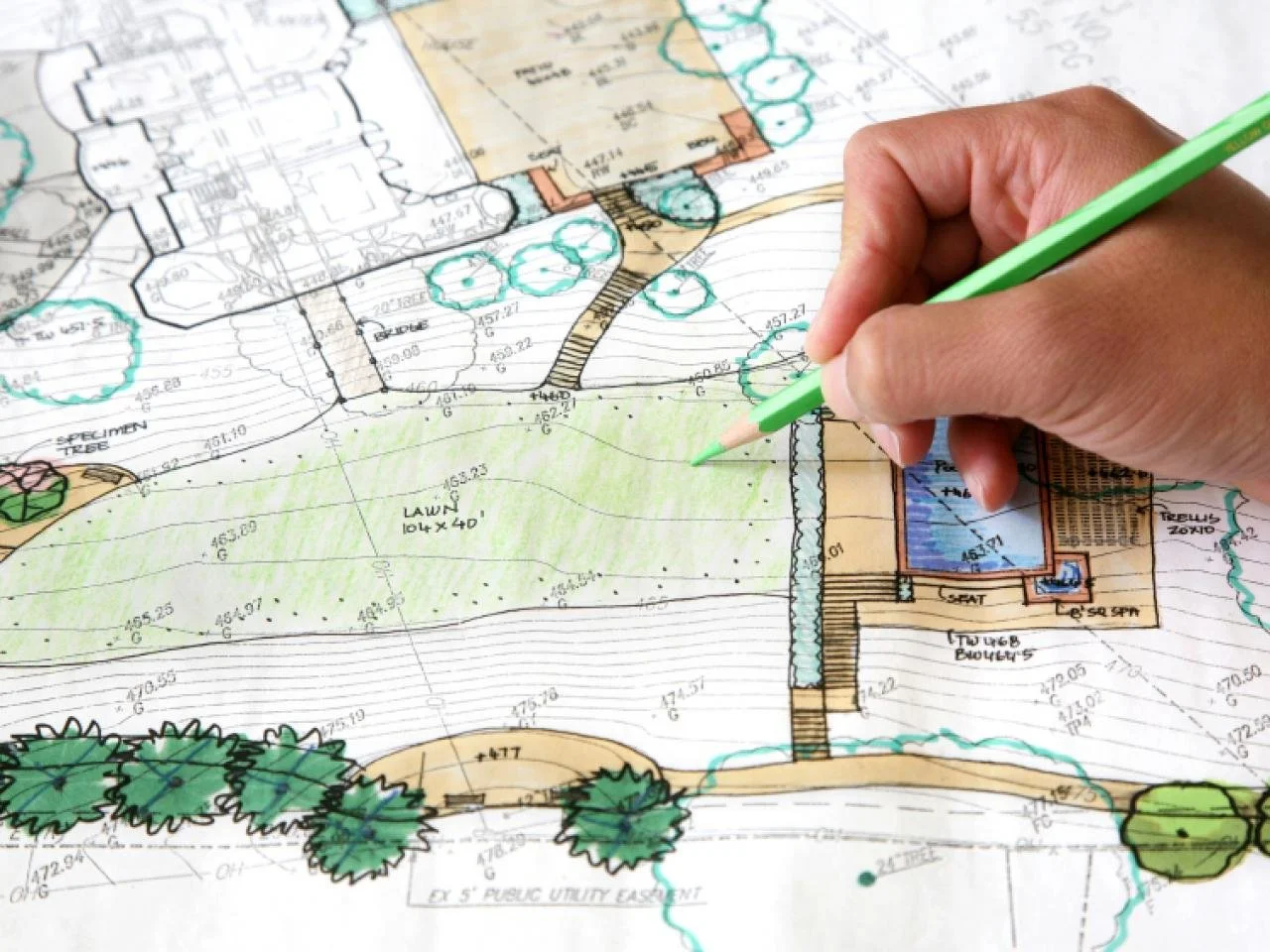 Residential landscape design plan being drawn for a new outdoor installation