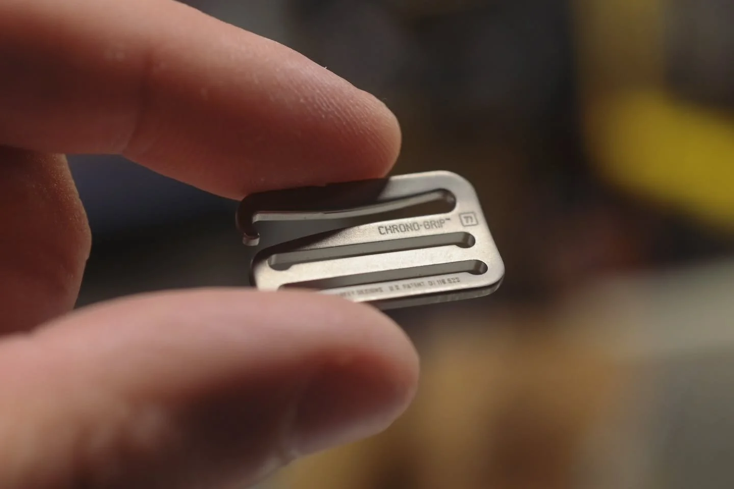 The updated Chrono-Grip marking scheme has arrived! It may only be 1mm in height and 7mm long, but after several years and thousands of dollars later, I have proudly etched my recently granted US Patent number to its Grade 5 Ti backside. 😄

Because 