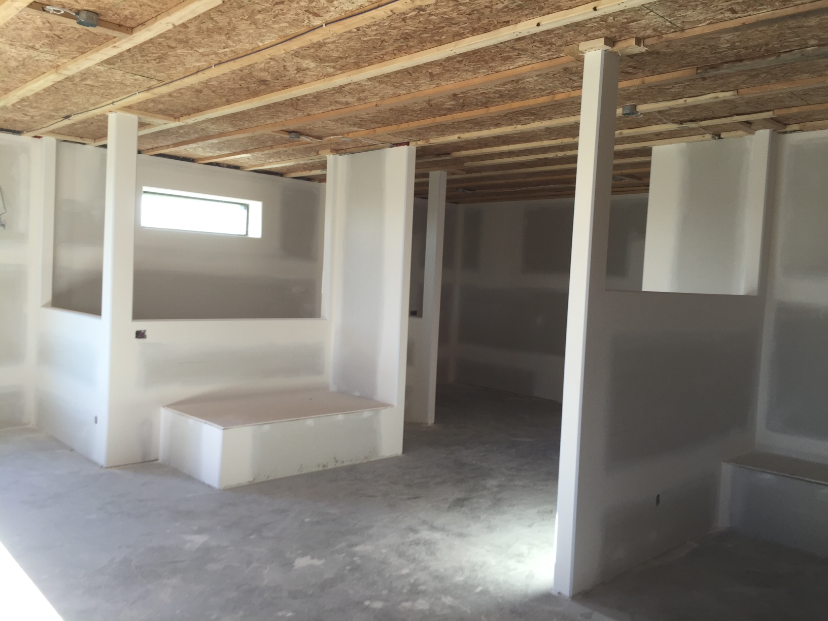 Ceiling has poly and osb as double vapor barrier. Strapped for mechanical to avoid envelope penetrations. 