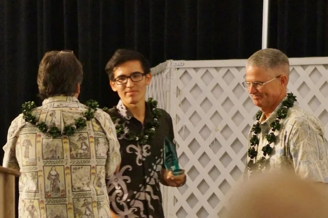 George Nemeth receiving his Gold Medal from Mr. Lewis and Br. Casey.