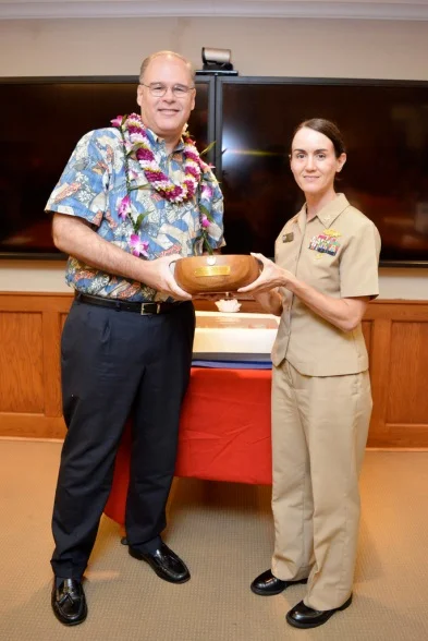 Paul Pollock receiving farewell gift From the command during Nov. 19, 2015 ceremony 