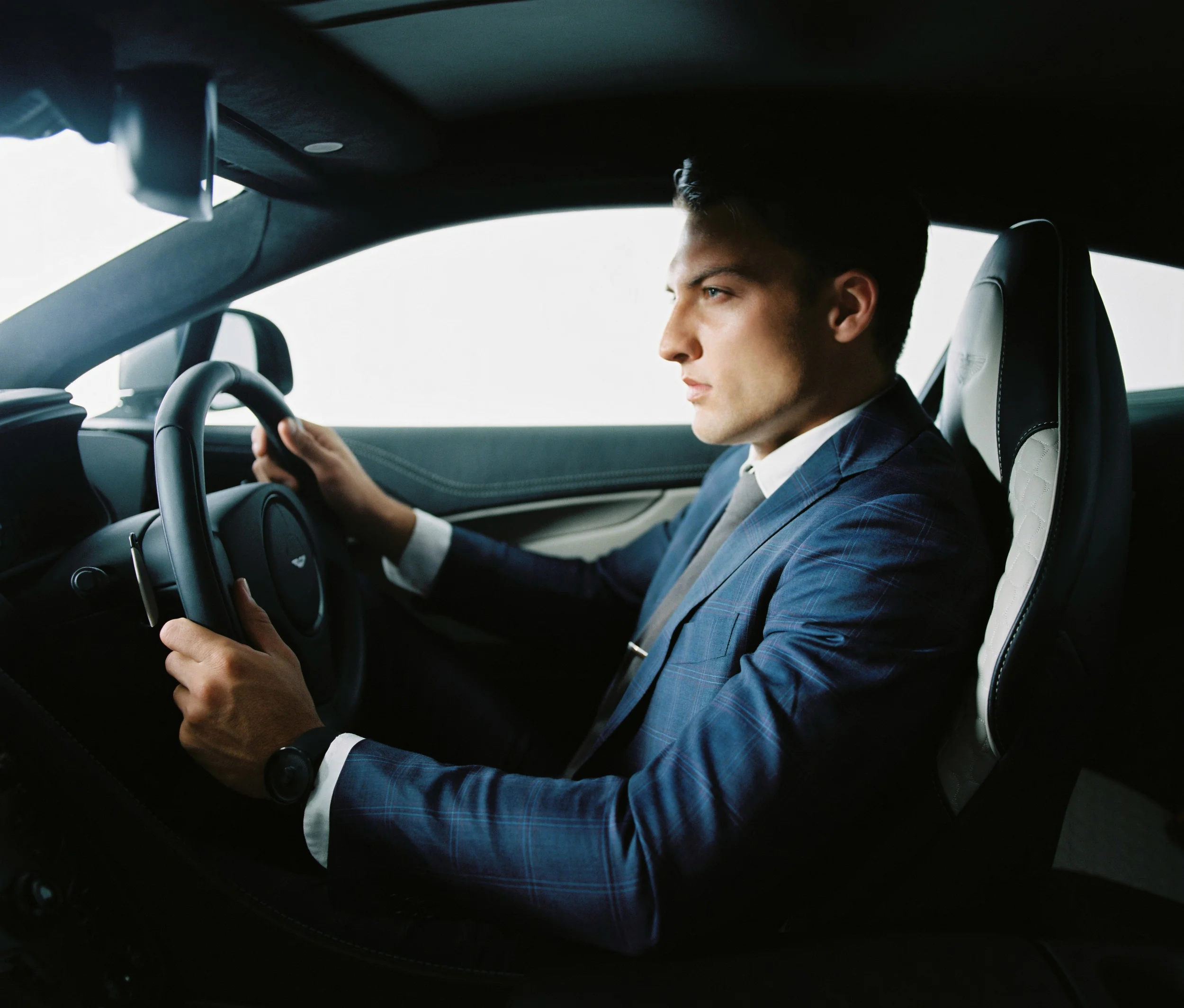 Suit: Mj Bale Car: Aston Martin