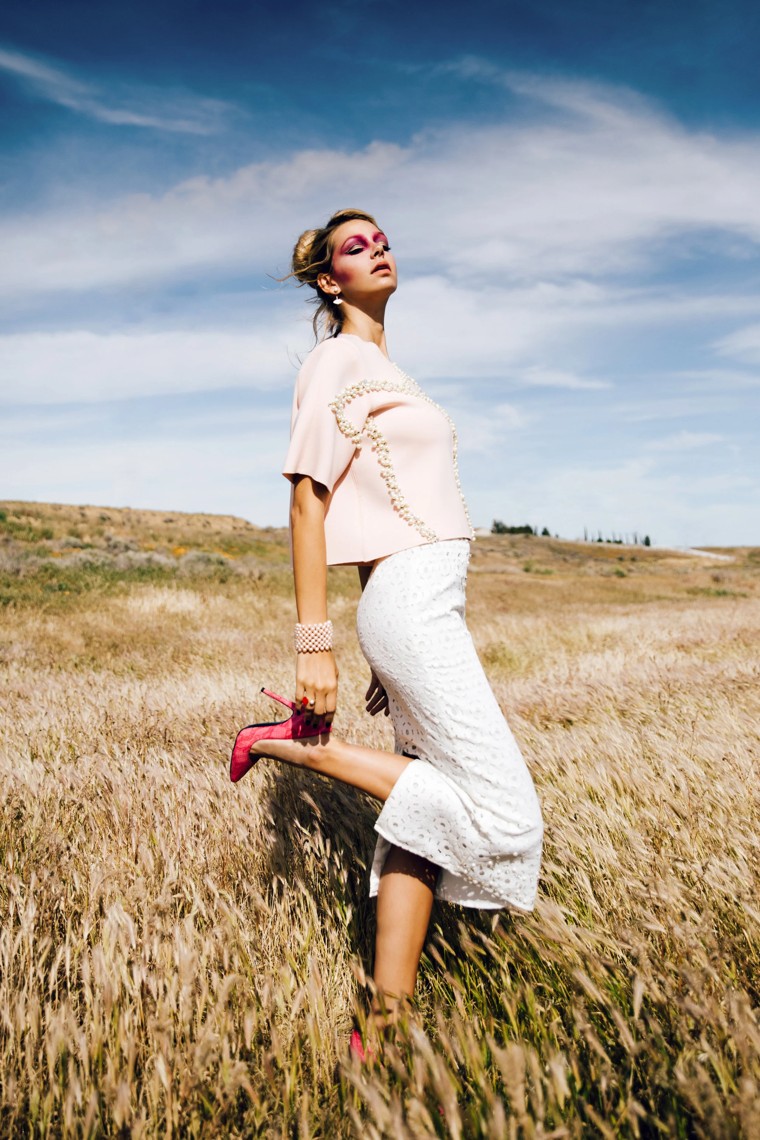 Top: Amelia Jang / Skirt: Lotuz / Earrings & Rings: NMD / Bracelet: NMD / Heels: Vezlaez 