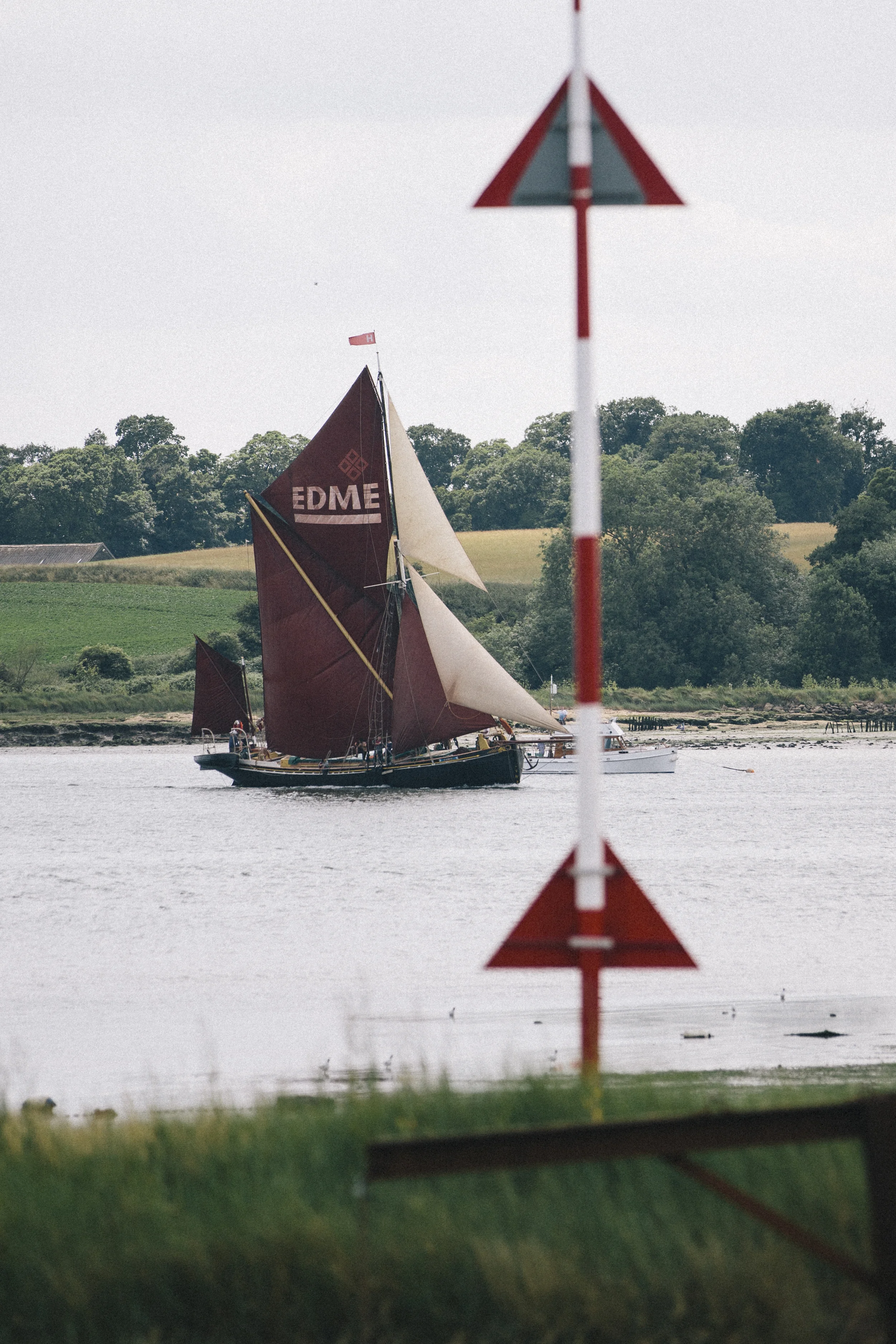 Edme, short tacking up the river Orwell towards the finish line at Pin Mill. Pin Mill Thames Sailing Barge Match 2015, Photo by Emily Harris