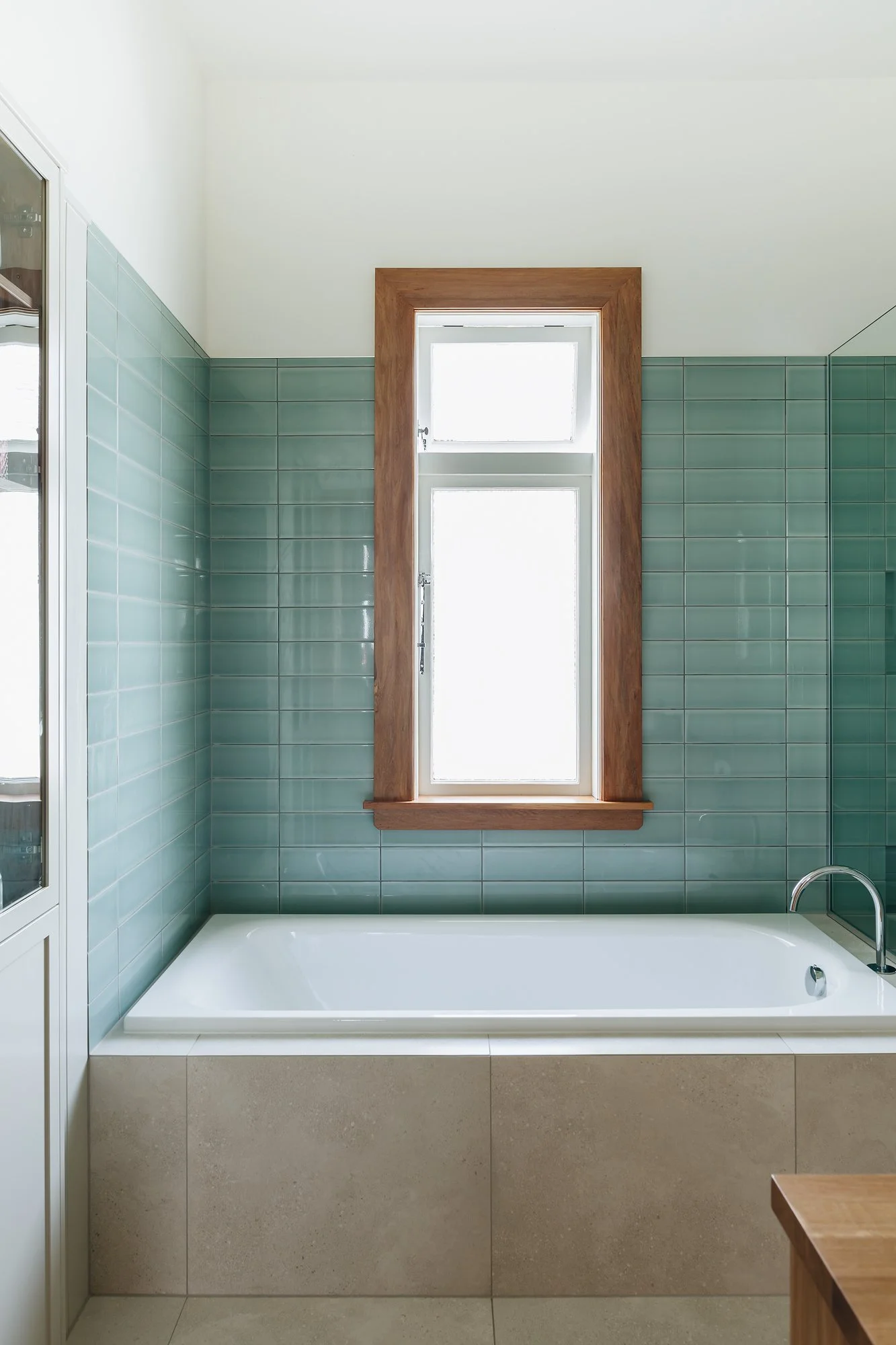 beachy-bathroom-tiled-drop-in-bathtub.jpg
