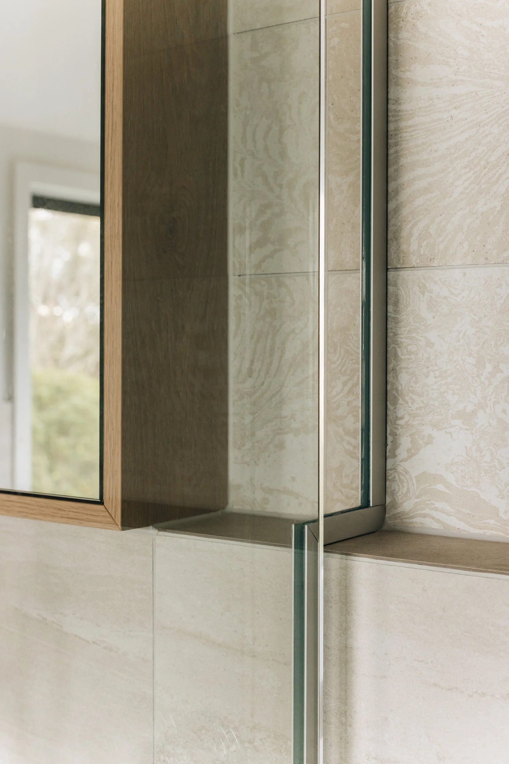  Modern ensuite bathroom with frameless tiled shower and custom mirror cabinet - Kerryn Dunshea Interior Design 
