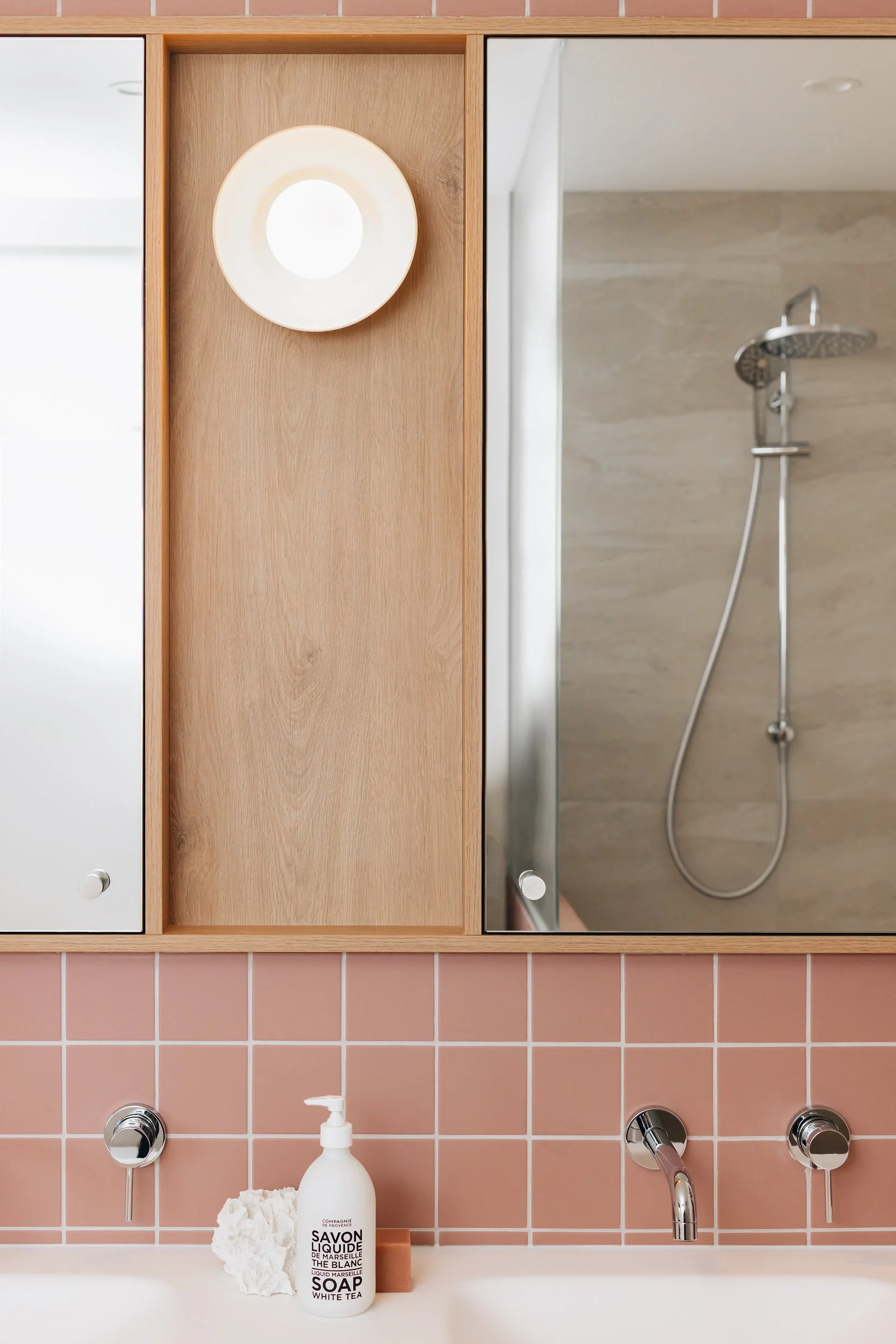 family-bathroom-double-mirror-oak-trim-vanity.jpg