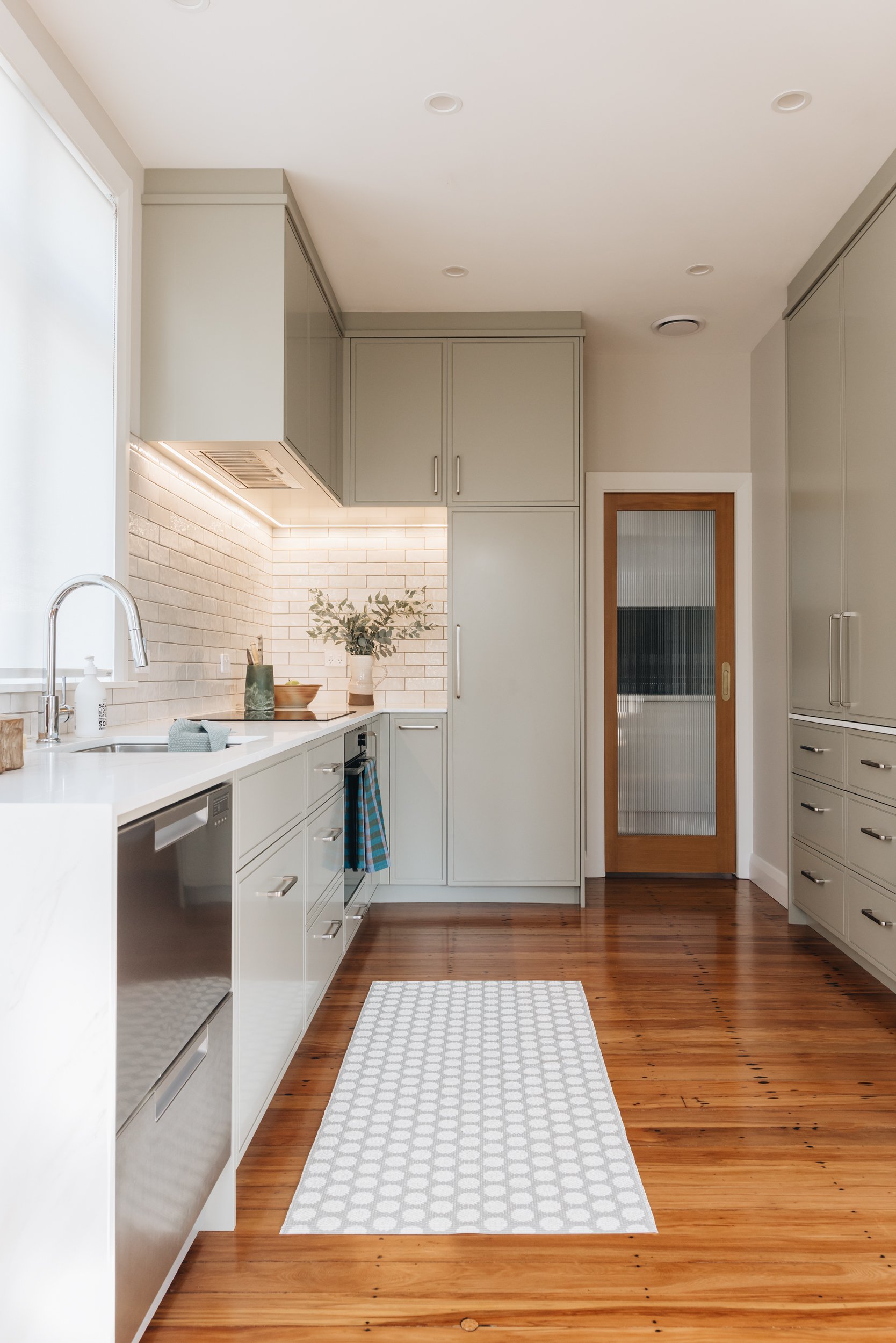 narrow-kitchen-layout-custom-cabinetry.jpg
