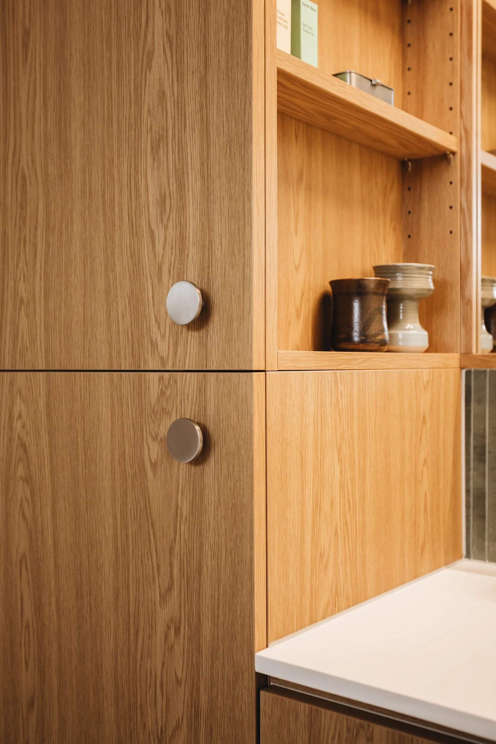 circle-satin-brass-handle-oak-cabinet.jpg
