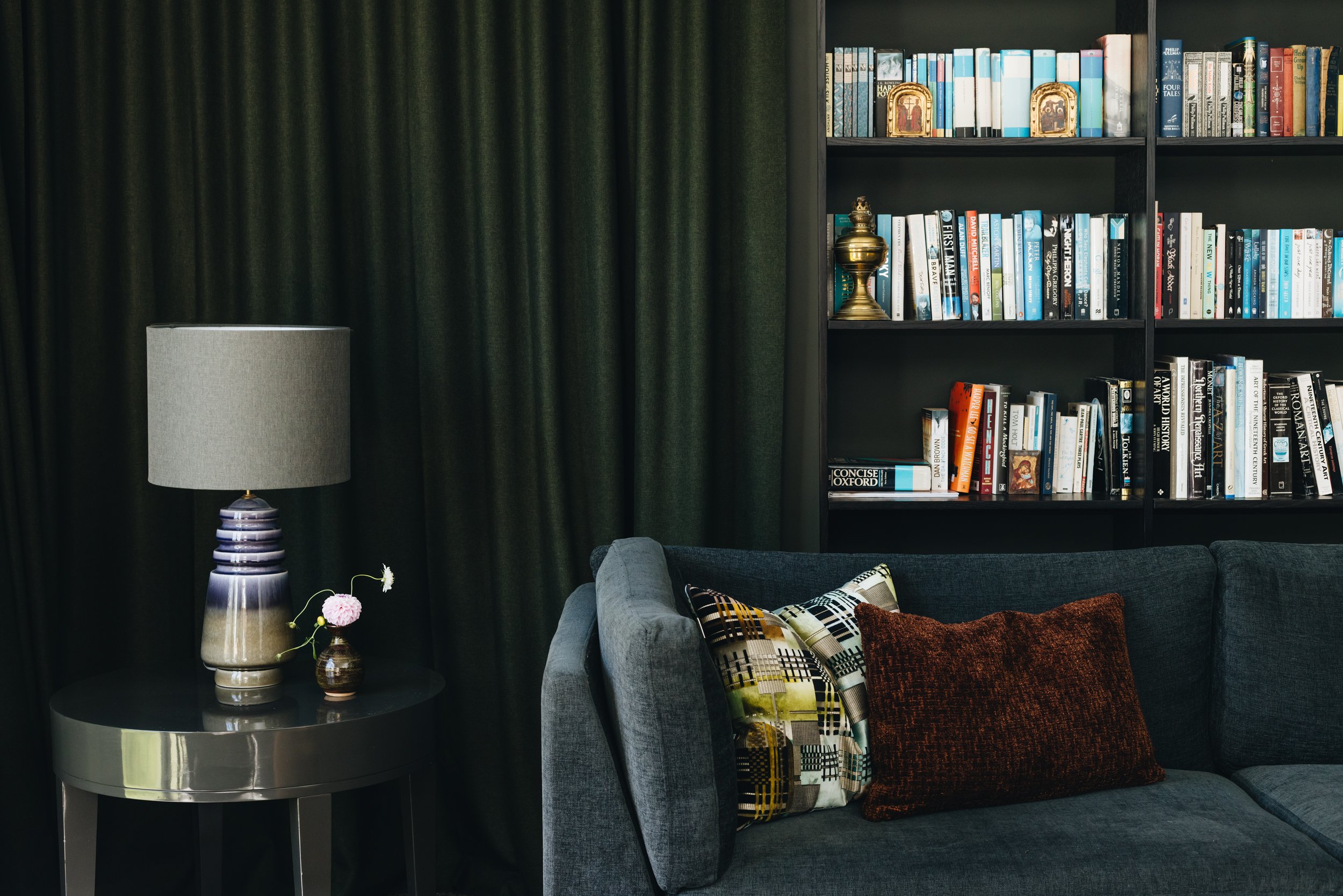 dark-green-curtains-moody-living-room-decor.jpg