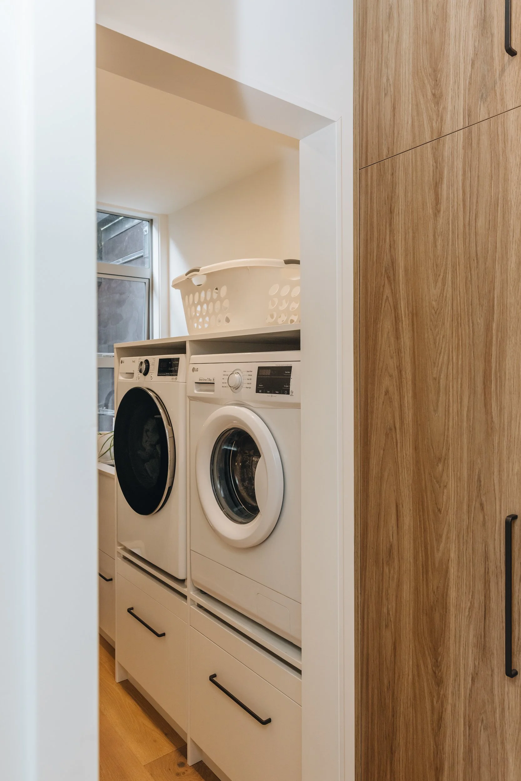 laundry-cabinetry-washing-machine-storage.jpg