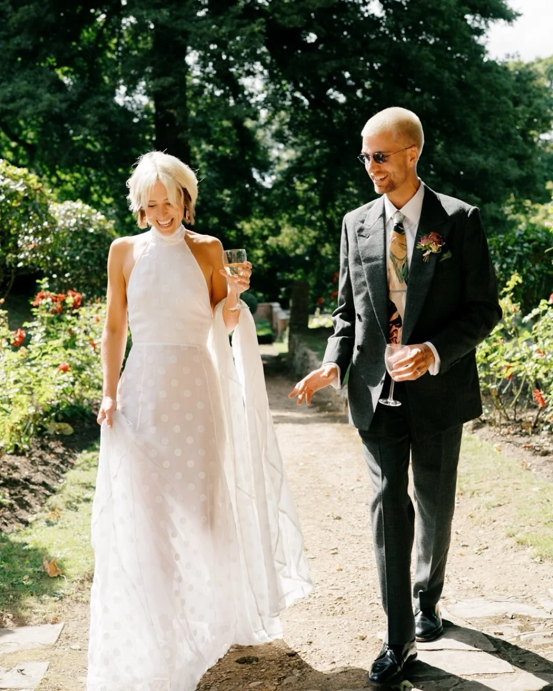 Emily &amp; Maarten chilling together before heading to their garden festival celebrations. 

Packed full of colour &amp; personality, Emily &amp; Maarten outlined their desire for a quiet family ceremony followed by an epic festival-vibes get togeth