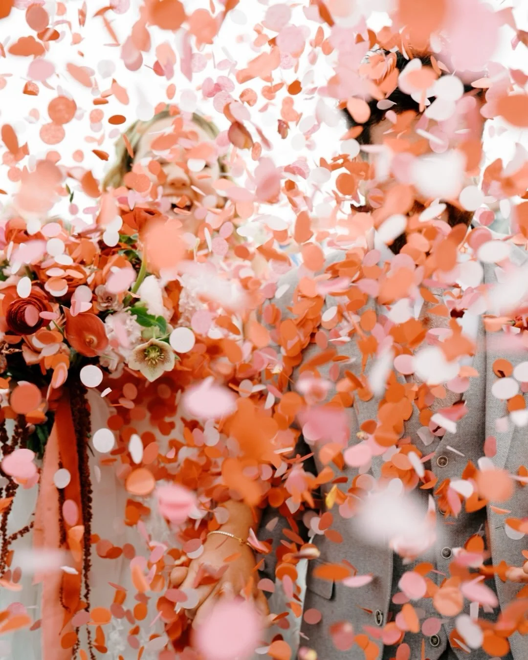 Chloe + Tom, confetti storm. 
They&rsquo;re in there somewhere.
Chloe&rsquo;s mega-watt smile shining through. 
I definitely ended up with a fair amount of @flutterdarlings in my mouth. Mix of digital &amp; 35mm film. 
What a vibe they brought. The c