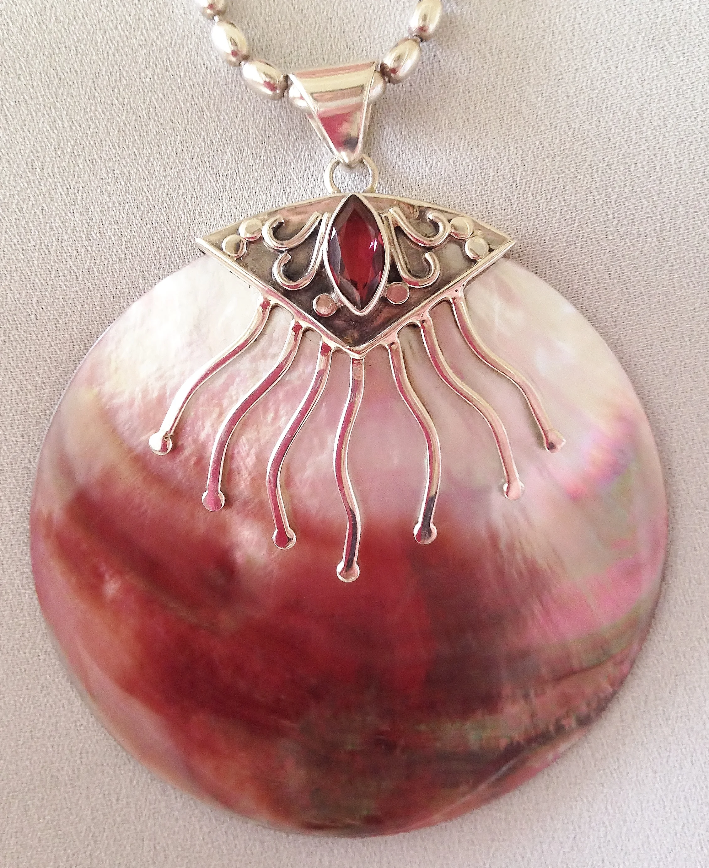silver-shell-garnet-pendant.JPG