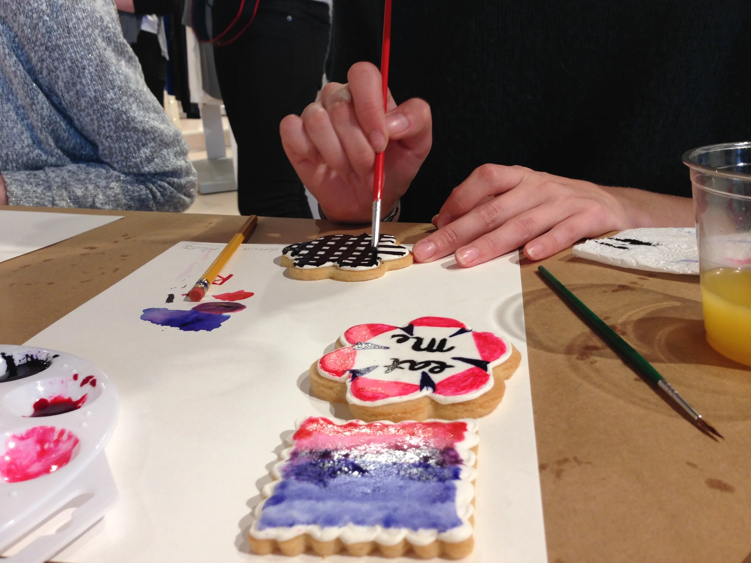 These are the hands and cookies of my class buddy Abigail. She is a talented artist (not just limited to cookies) and happens to live a few blocks from the house I grew up in! Turns out, she had her own booth at Art Goggle this fall and I visited her booth! 