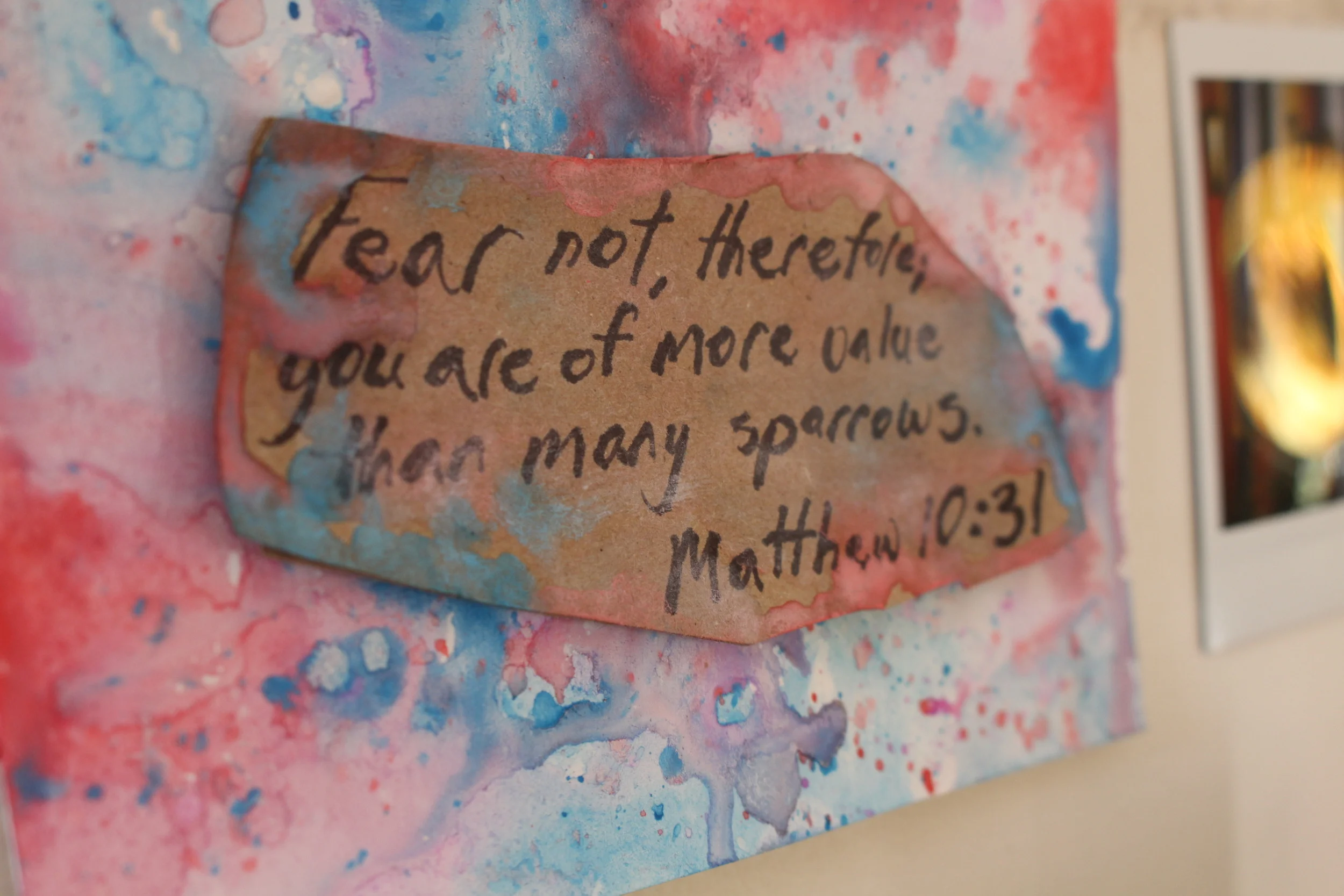 A verse a friend wrote out for me on a paper bag that I turned into an art piece for my wall