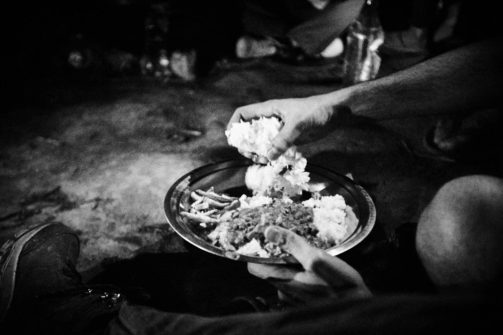 Dinner provided by the villagers of Sakhuwa. We had to eat our dal-bhaat (a staple in Nepal) under flashlights due to power cuts.