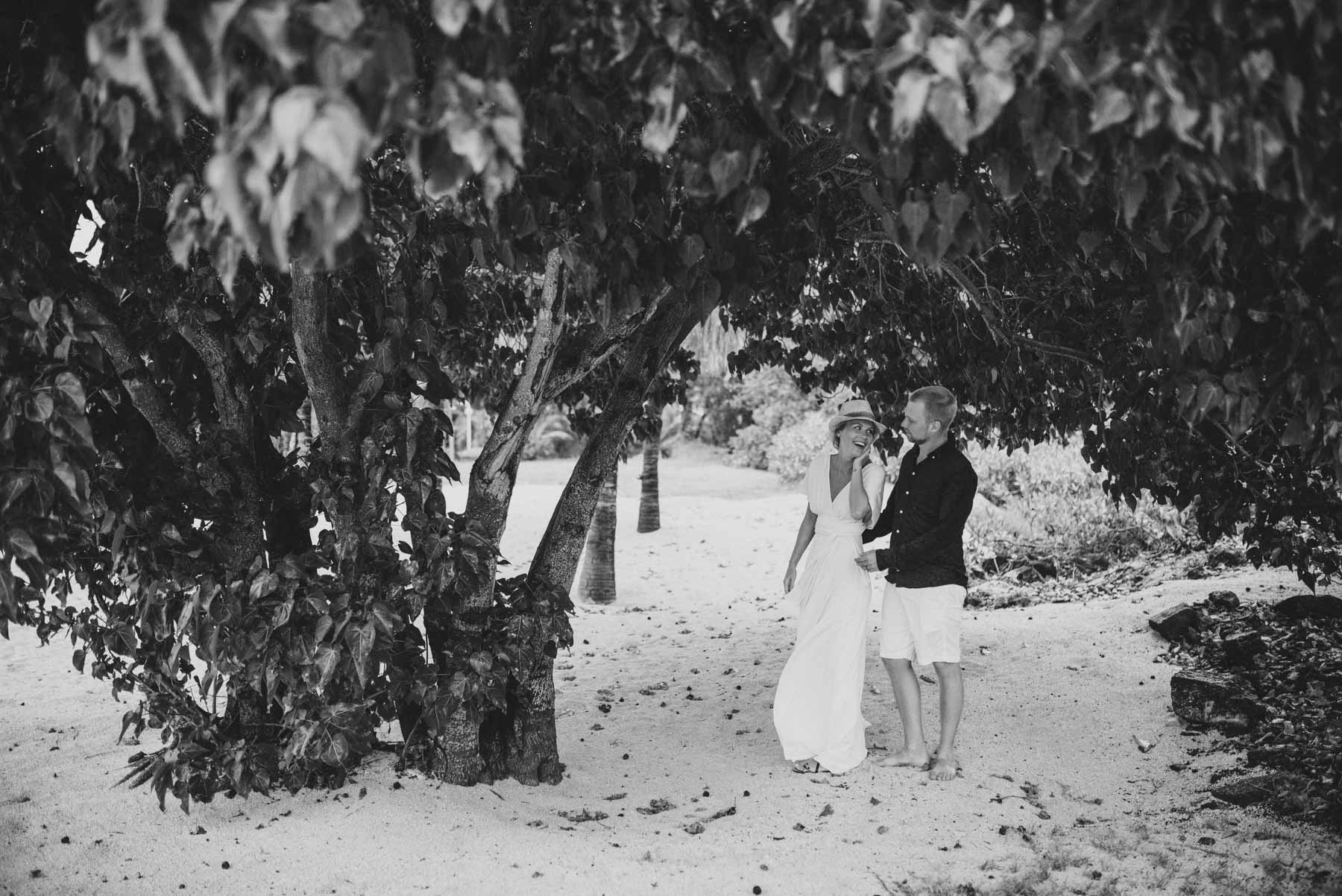 Copy of Sita Kelly | Mauritius Honeymoon Photographer | woman in white dress with man in hat under a tree