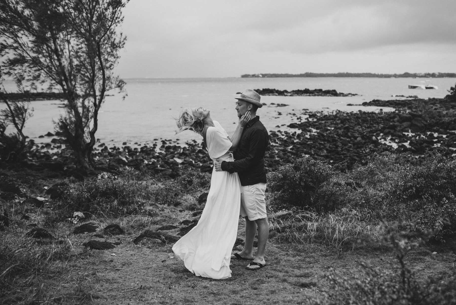 Copy of Sita Kelly | Mauritius Honeymoon Photographer | Couple embracing, woman laughing