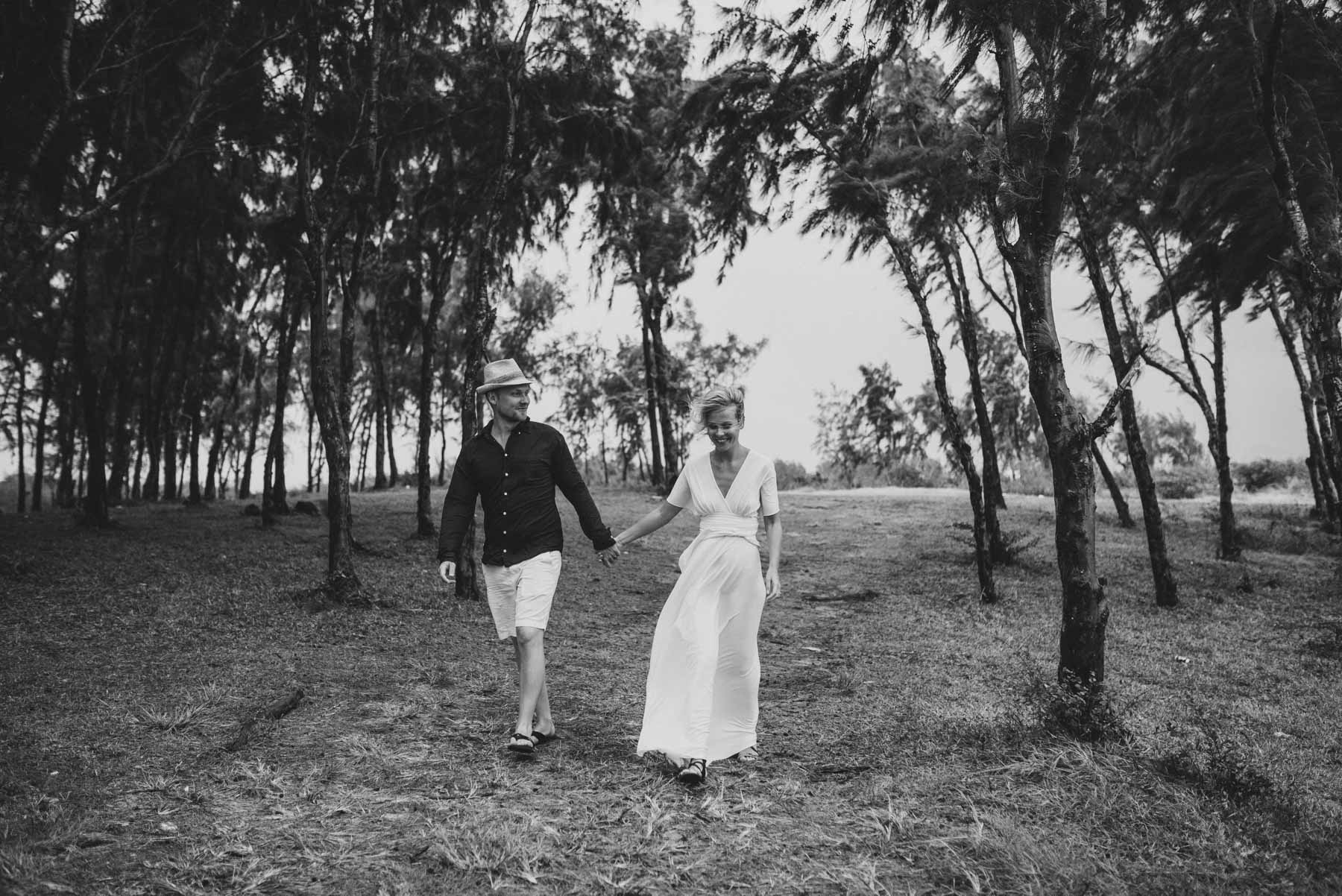 Copy of Sita Kelly | Mauritius Honeymoon Photographer | Couple walking through trees
