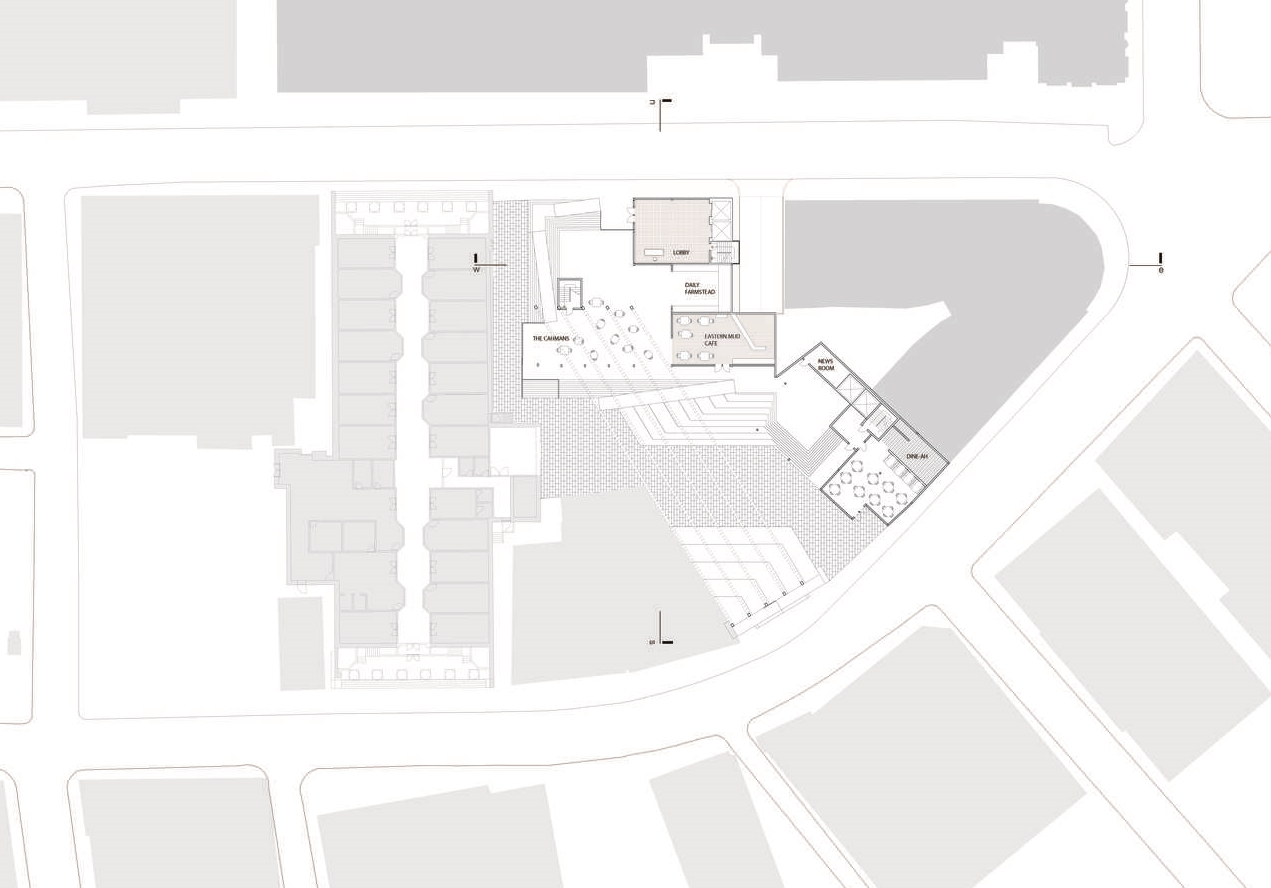 The ground floor is a large piazza with outdoor gathering spaces. Inside is daily market kiosks, pop-up food shops, and one permanent restraunt. 