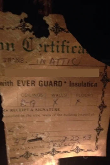 I found this tattered certificate hanging from one of the rafters. It says in 1983 the attic was insulated to R-19, but the walls and floors are uninsulated.