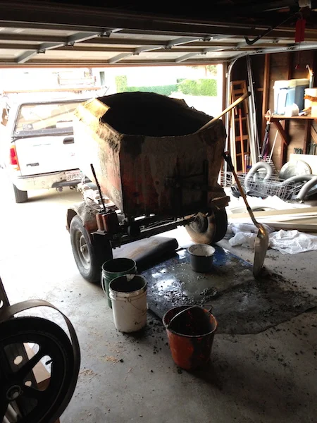 Few things invoke a sense of urgency quite like a trailer full of wet concrete sitting in your garage.