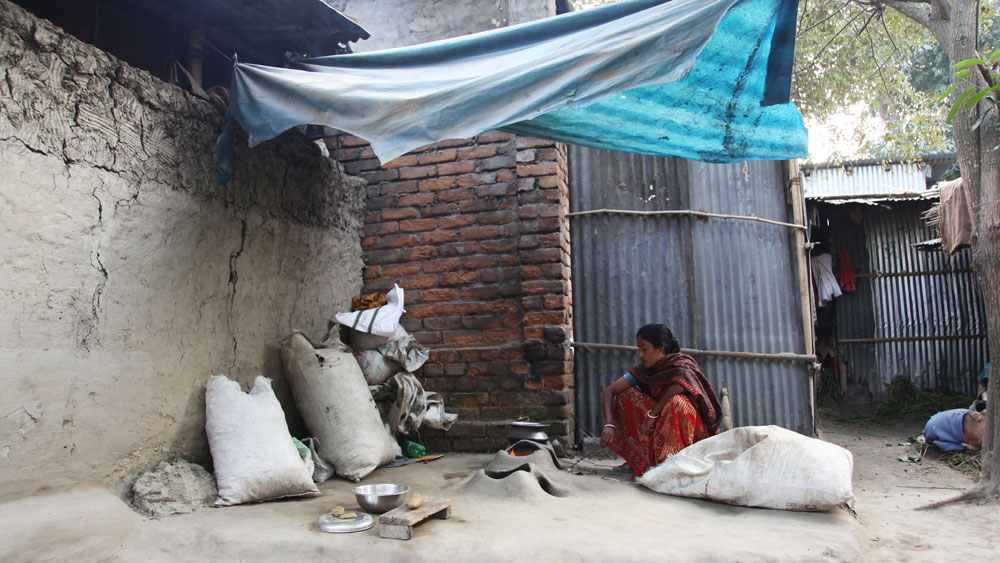 Cooking under tarpaulin