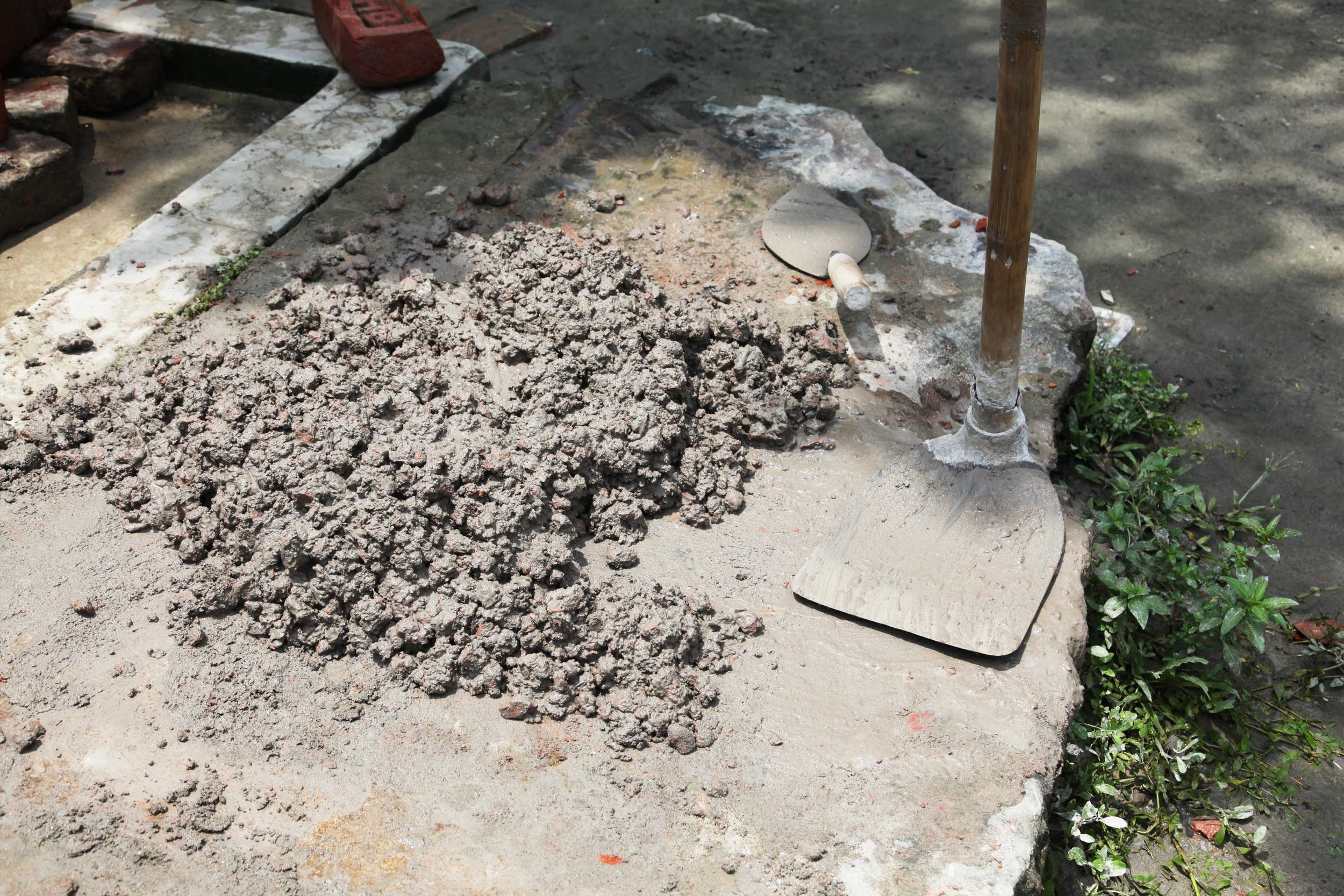 AzuKo - Concrete mixing for foundations - Bangladesh.jpg