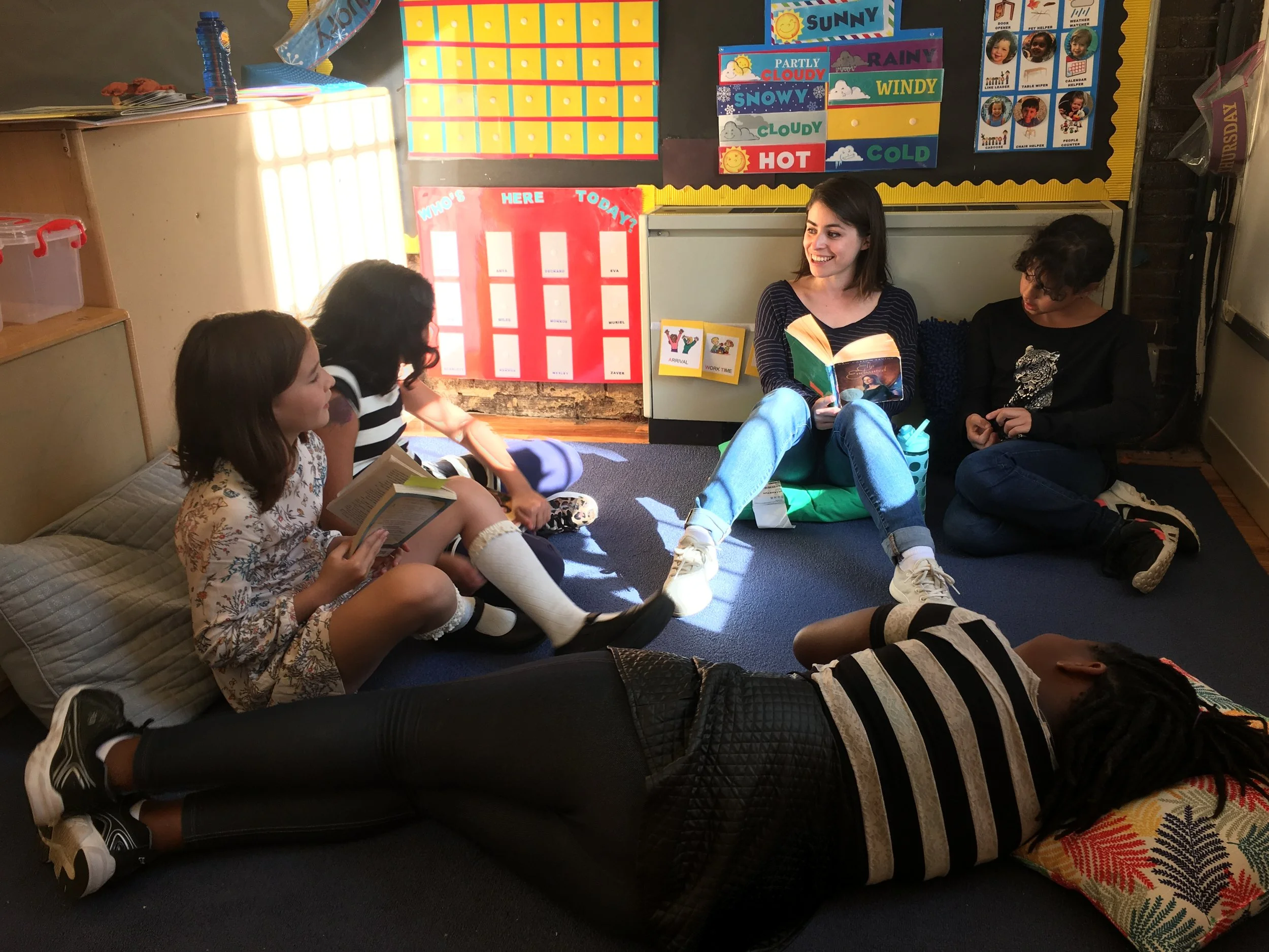 Students discuss their reading at Book Club with Kelly