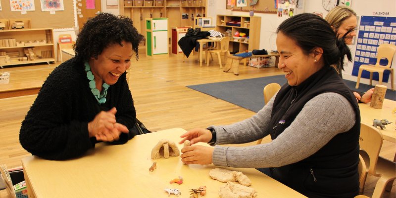 Parents of 3/4s students working together to create ideal habitats for different species of animals. Teachers were nearby posing questions for them to think through in their conversations and construction.