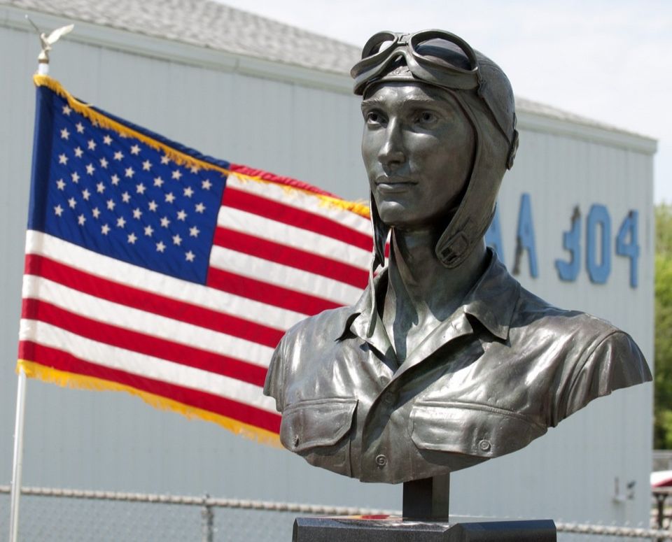 The new monument "The Aviator" during its dedication at the Jackson County Airport on Friday, May 17. (Shelby Mack | MLive.com)