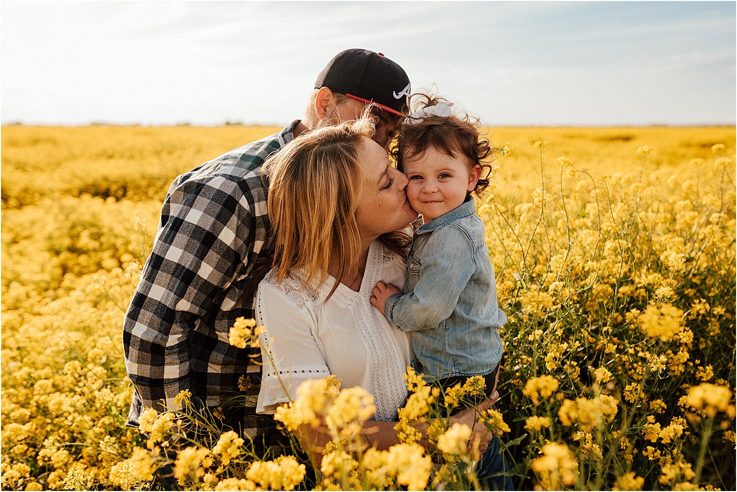 spring field of yellow flowers family session6.jpg