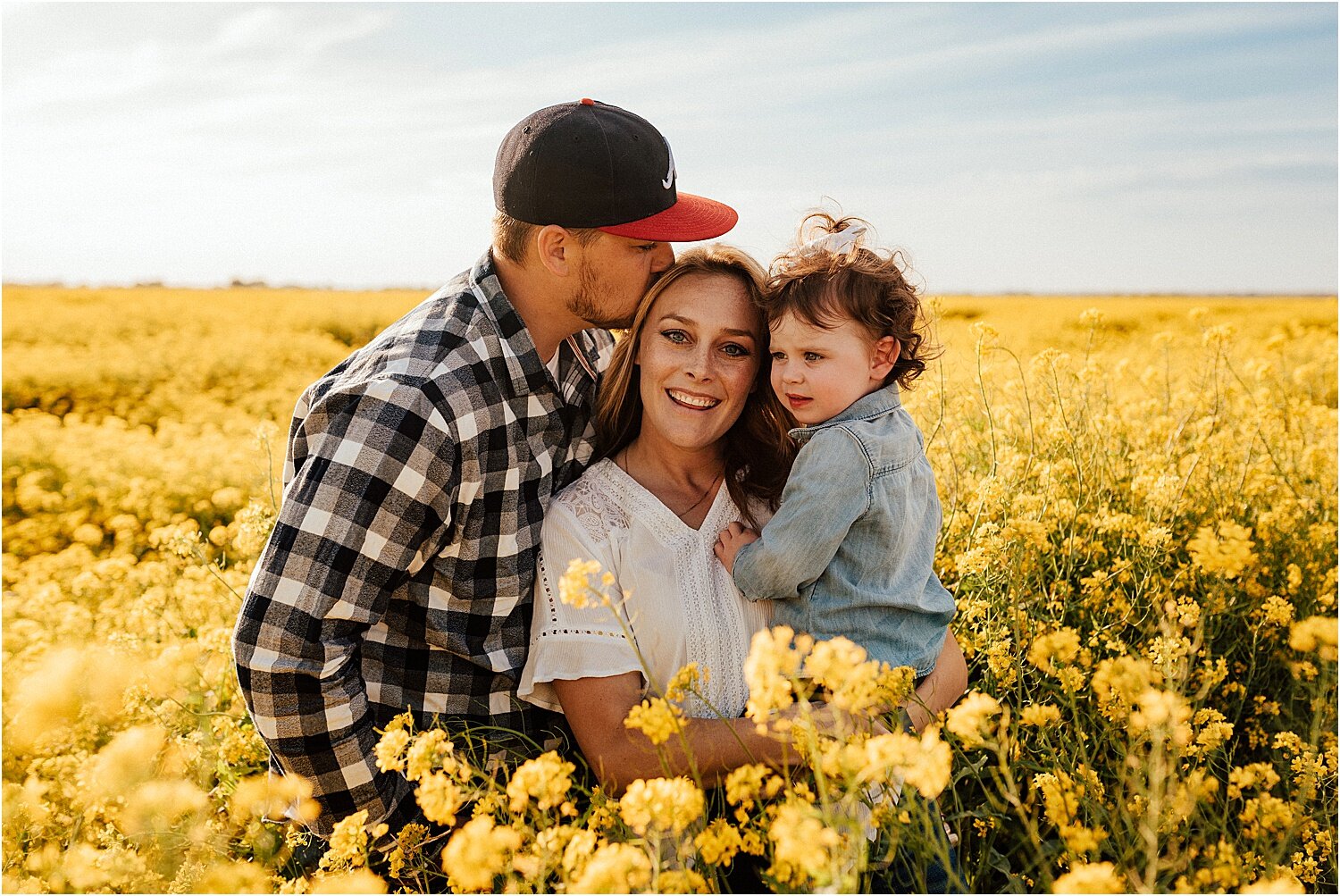 spring field of yellow flowers family session7.jpg