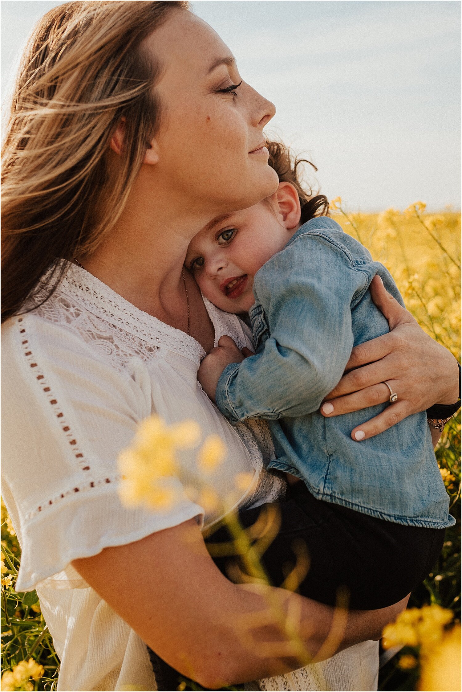 spring field of yellow flowers family session11.jpg