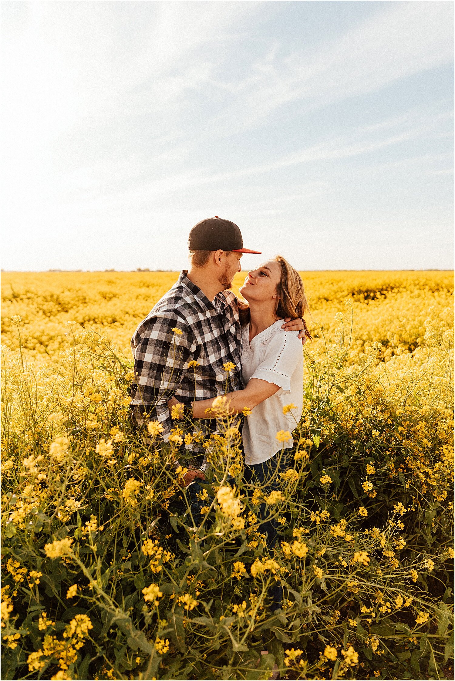 spring field of yellow flowers family session21.jpg