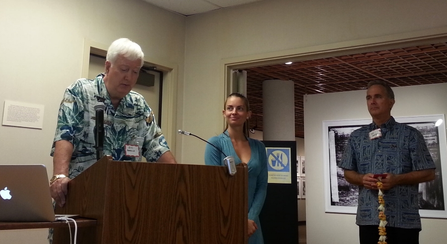 L -Dr. William Zanella, C- Kaitlyn Patrick. R - Jeffry Hackler readying to present the lei.