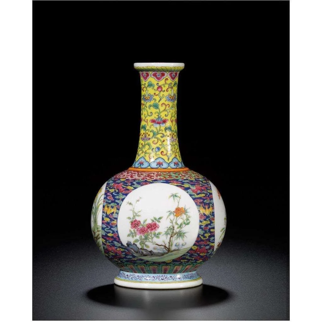 A Famille-rose Porcelain Vase, Qianlong mark and period, h. 7 1/4 in., former J.T. Tai Collection; sold at auction in 2010 for USD18,149,677.
