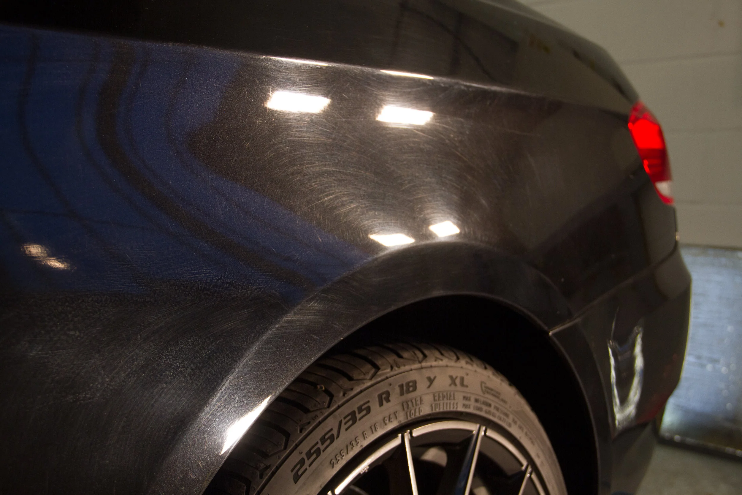 Heavy swirling and marring caused by weekly hand car washes.